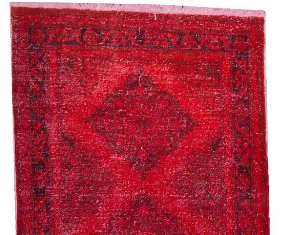 A vintage Turkish runner rug re-dyed in red color. Great for contemporary interiors.
Finely hand knotted, low wool pile on cotton foundation. Professionally washed.
Sturdy and can be used on a high traffic area, suitable for both residential and
