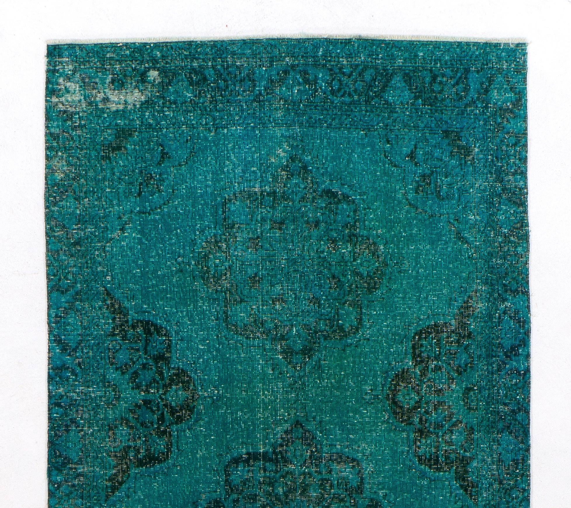A vintage Turkish runner rug re-dyed in teal color. Great for hallway decor.
Finely hand knotted, low wool pile on cotton foundation. Professionally washed.
Sturdy and can be used on a high traffic area, suitable for both residential and