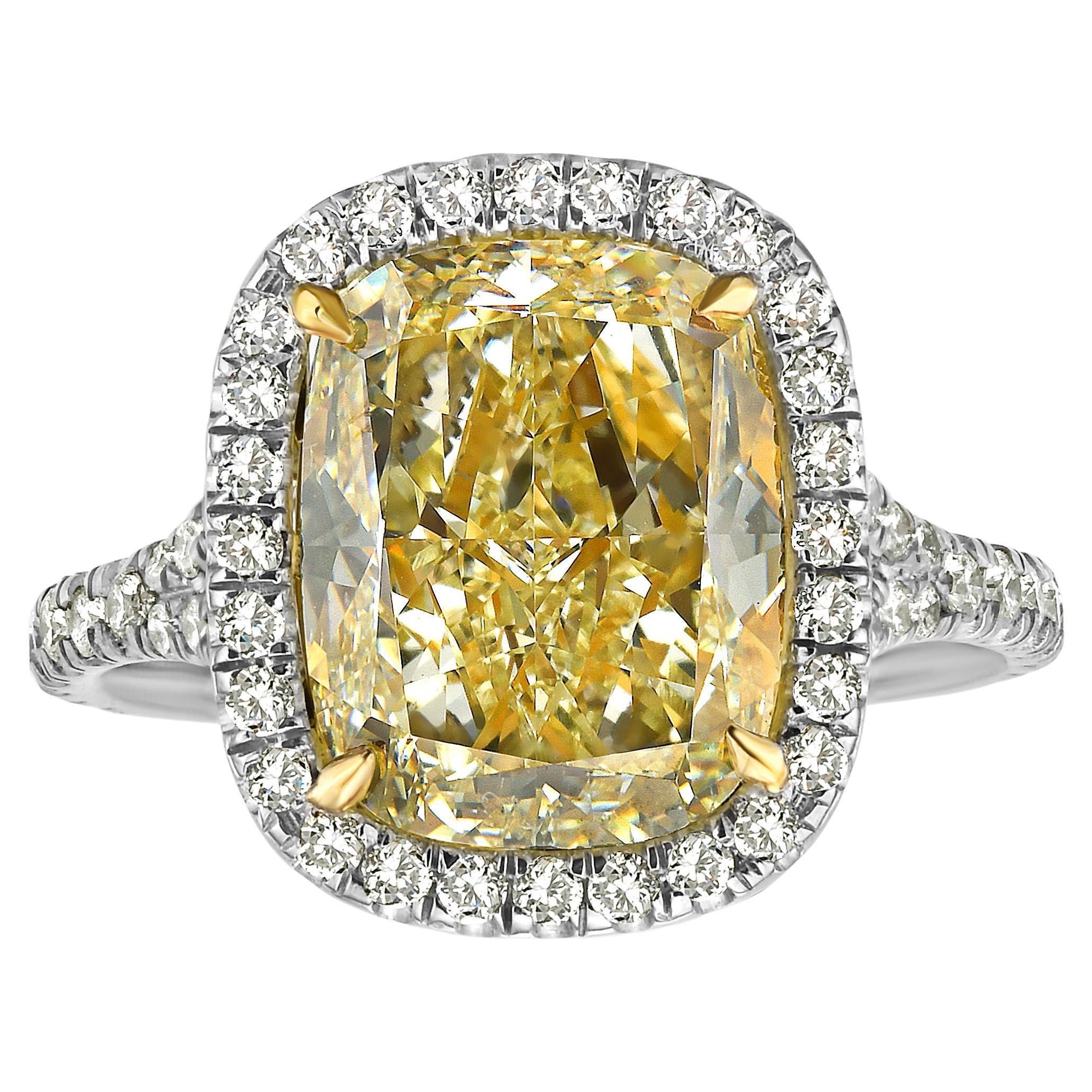 4.7 Carat Light Yellow Cushion Halo Diamond Ring For Sale