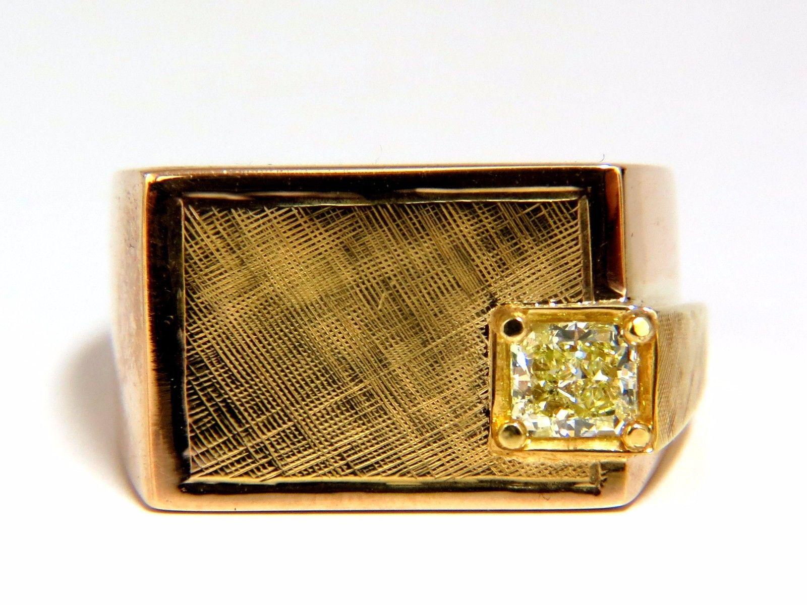 Men's Rectangular Deck & Fancy Ring.

.47ct. natural princess cut diamond.

Si-1 clarity

Fancy Light Yellow color

Natural, Earth Mined.

3.9 X 4.9mm

14kt. Rose gold (with green gold top finish).

19.9 grams.

Ring is 12.5mm wide 

current ring