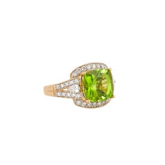 Sunita Nahata Peridot 4.70ct. Fancy Ring in 18Karat Yellow Gold with Diamond.