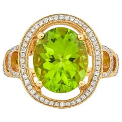 Ring aus 18 Karat Gelbgold mit 4,7 Karat Peridot und Diamant