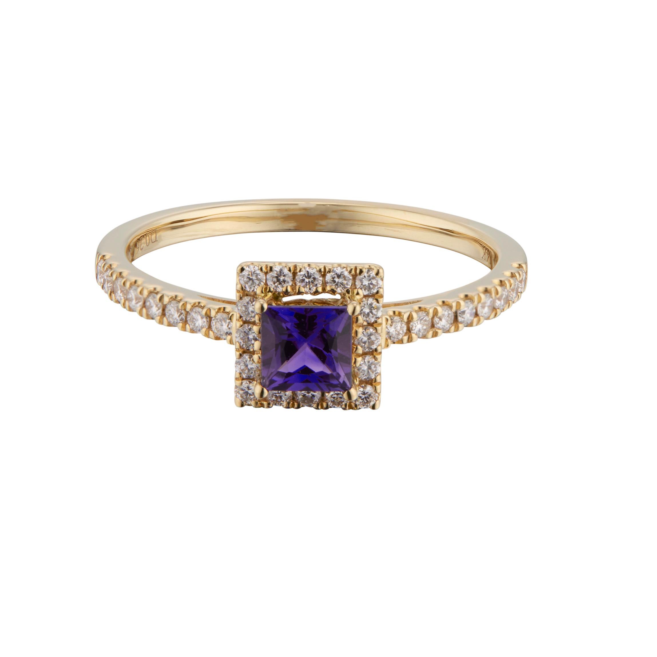Sapphire and diamond engagement ring. 1 square purple and blue center sapphire, in a 14k yellow gold setting with a square halo of round cut diamonds, accented by round cut diamonds along both sides of the shank. 

1 purple square cut sapphire,