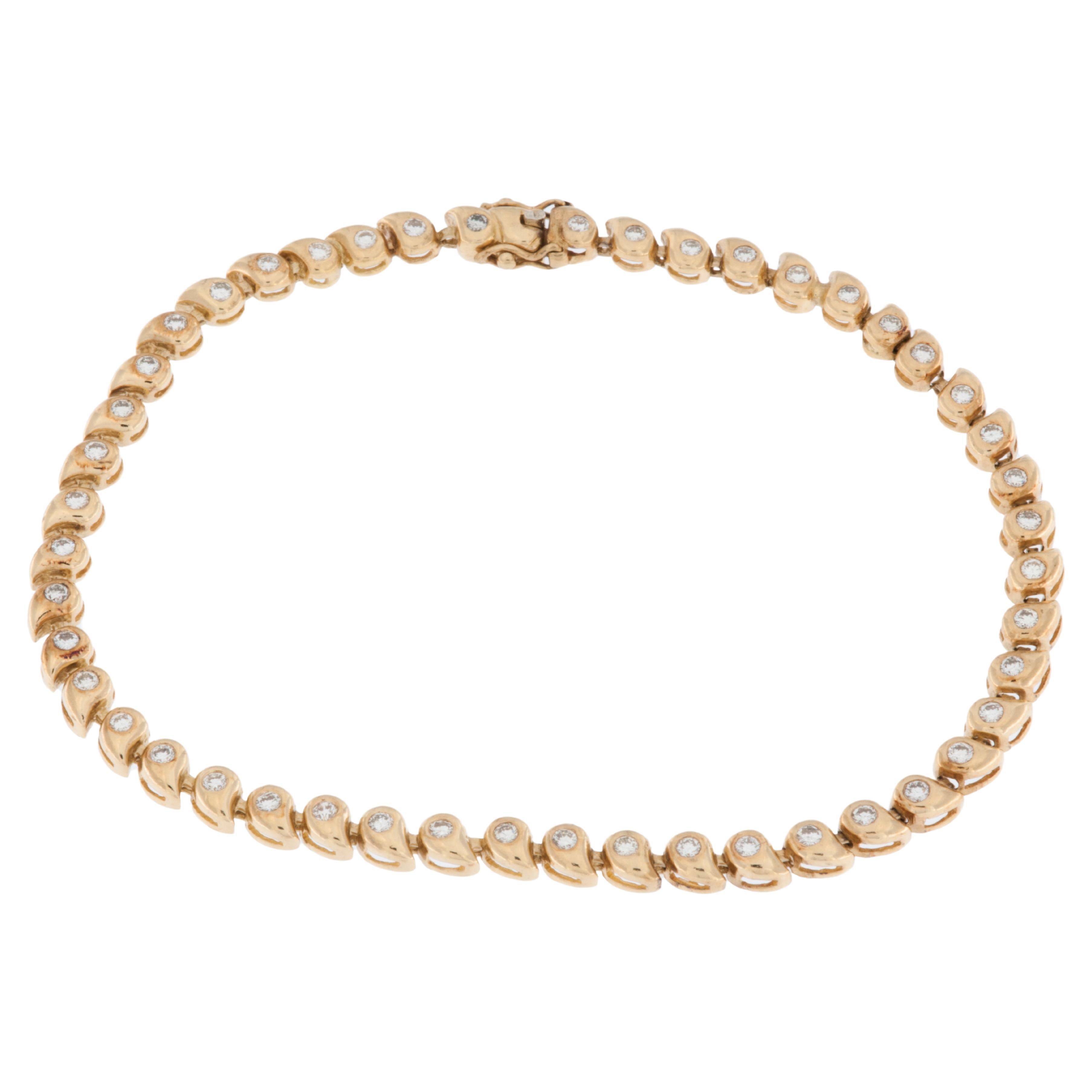 Bracelet tennis en or jaune 18 carats avec 47 diamants en vente