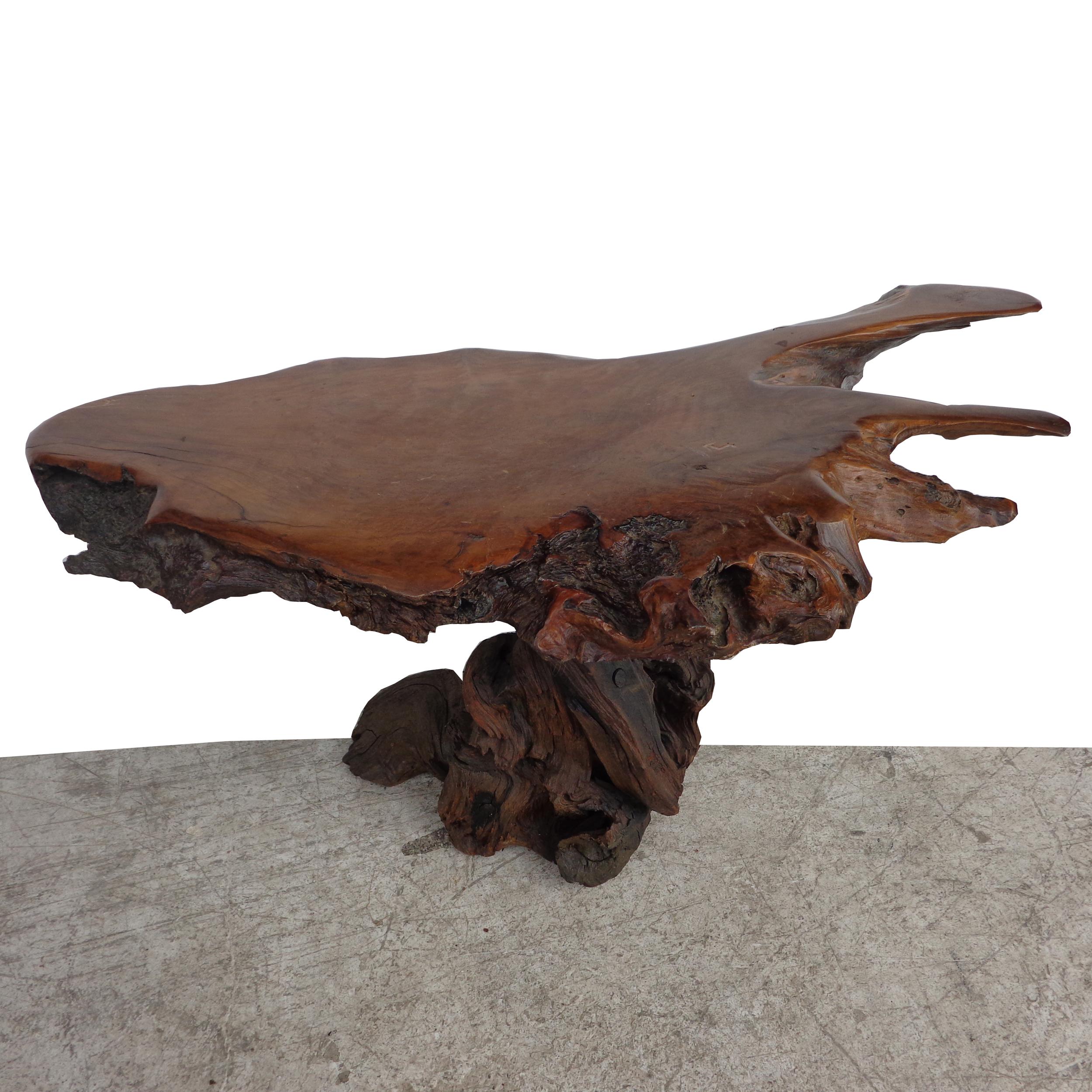 Live edge side table

Beautiful sculptural live edge coffee or side table.
Measures: 47