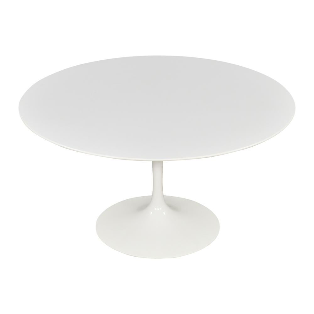 A signed 50th Anniversary, 47 inch diameter, Eero Saarinen for Knoll, Tulip Pedestal Dining table, circa 2000s. The top is finished in the classic smooth white architectural laminate, adhered to a wood substraight. There is an intermediate enameled
