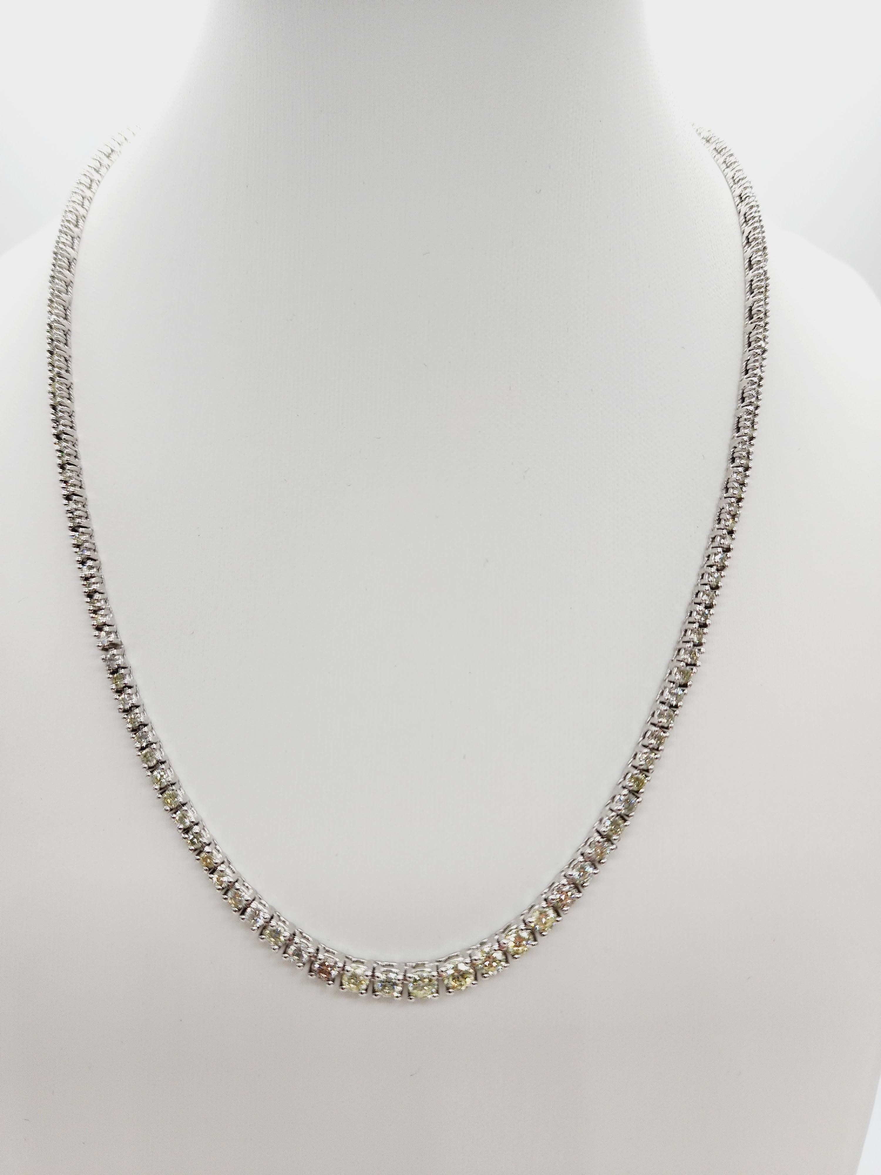Brilliant and beautiful Riviera necklace, round-brilliant cut natural diamonds. 
14k white gold classic four-prong style for maximum light brilliance.
16 inch length. Average color J Color, I Clarity. 