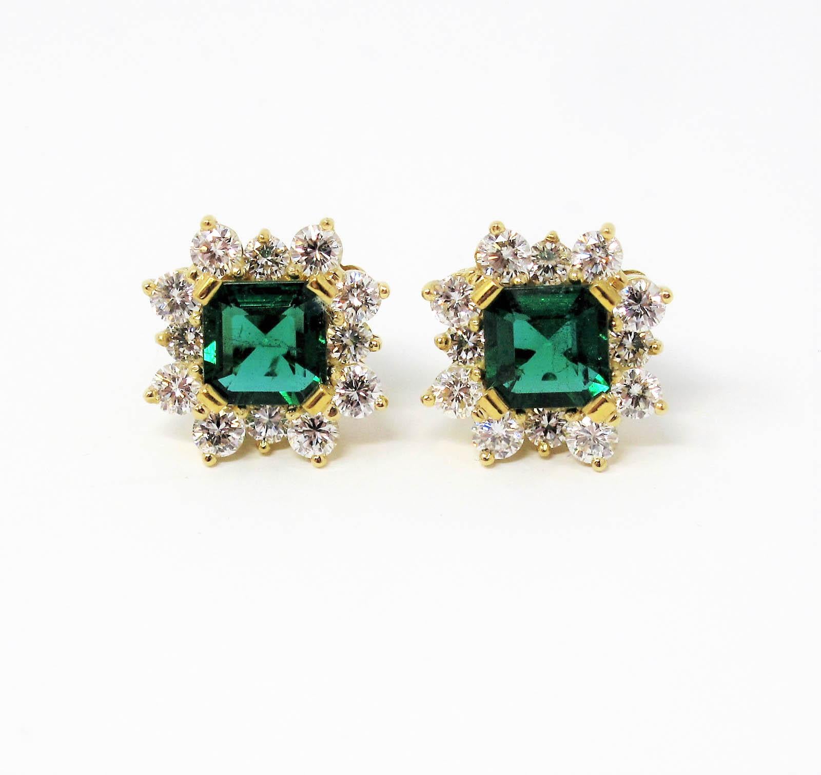 Absolutely incredible vintage-inspired emerald and diamond halo stud earrings. These eye-catching earrings give off major Old Hollywood glamour vibes with their striking green color and exquisite detail. The semi-rounded diamond halo gently softens