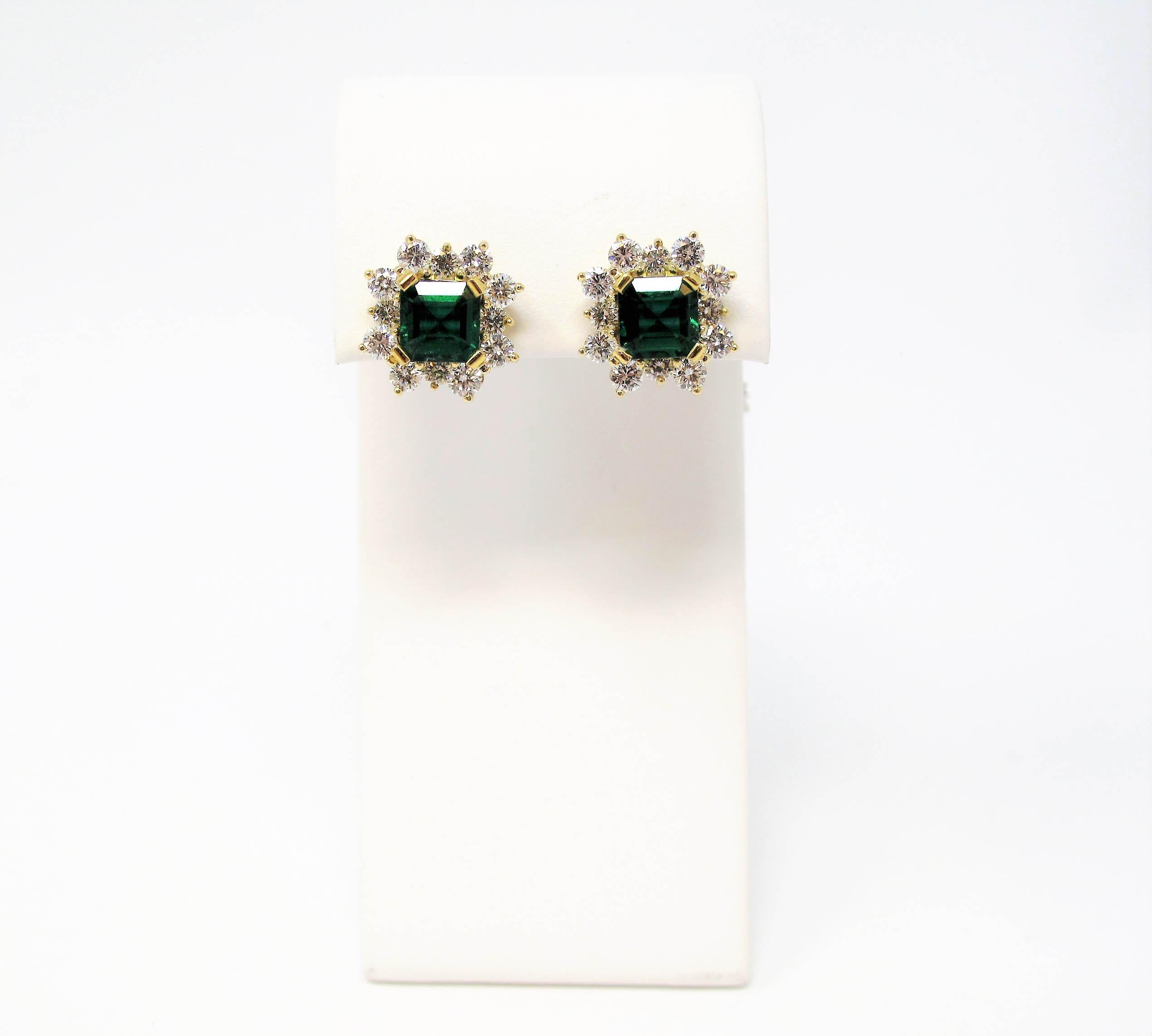4.70 Carat Emerald Cut Emerald and Diamond Halo Stud Earrings 18 Karat Gold For Sale 2