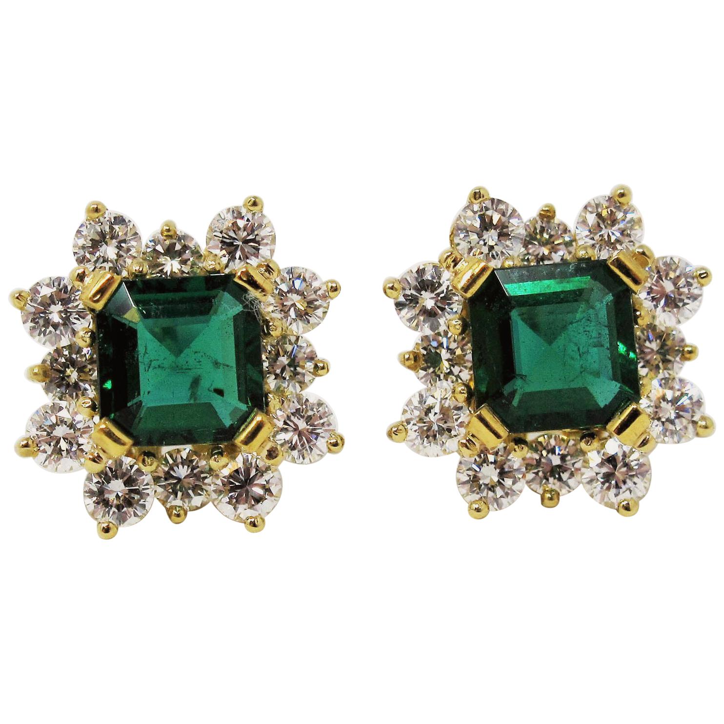Emerald Cut Emerald and Diamond Halo Stud Earrings at 1stDibs emerald cut emerald earrings