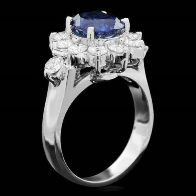 4.70 Carats Exquisite Natural Blue Sapphire and Diamond 14K Solid White Gold Ring

Total Blue Sapphire Weight is: Approx. 3.50 Carats

Sapphire Measures: Approx. 9.00 x 7.00mm

Sapphire Treatment: Diffusion

Natural Round Diamonds Weight: Approx.