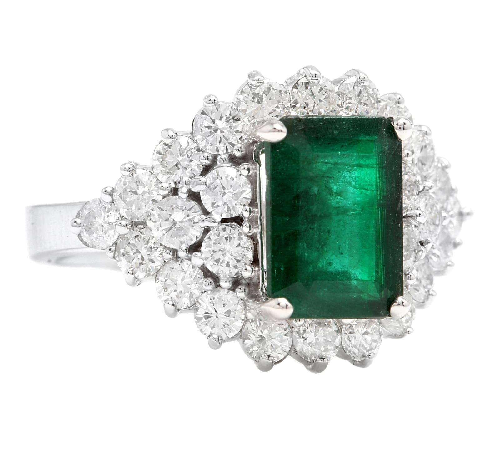 4.70 Carats Natural Emerald and Diamond 14K Solid White Gold Ring

Total Natural Green Emerald Weight is: Approx. 3.00 Carats (transparent)

Emerald Measures: Approx. 9.80 x 7.12mm

Emerald Treatment: Oiling

Natural Round Diamonds Weight: Approx. 