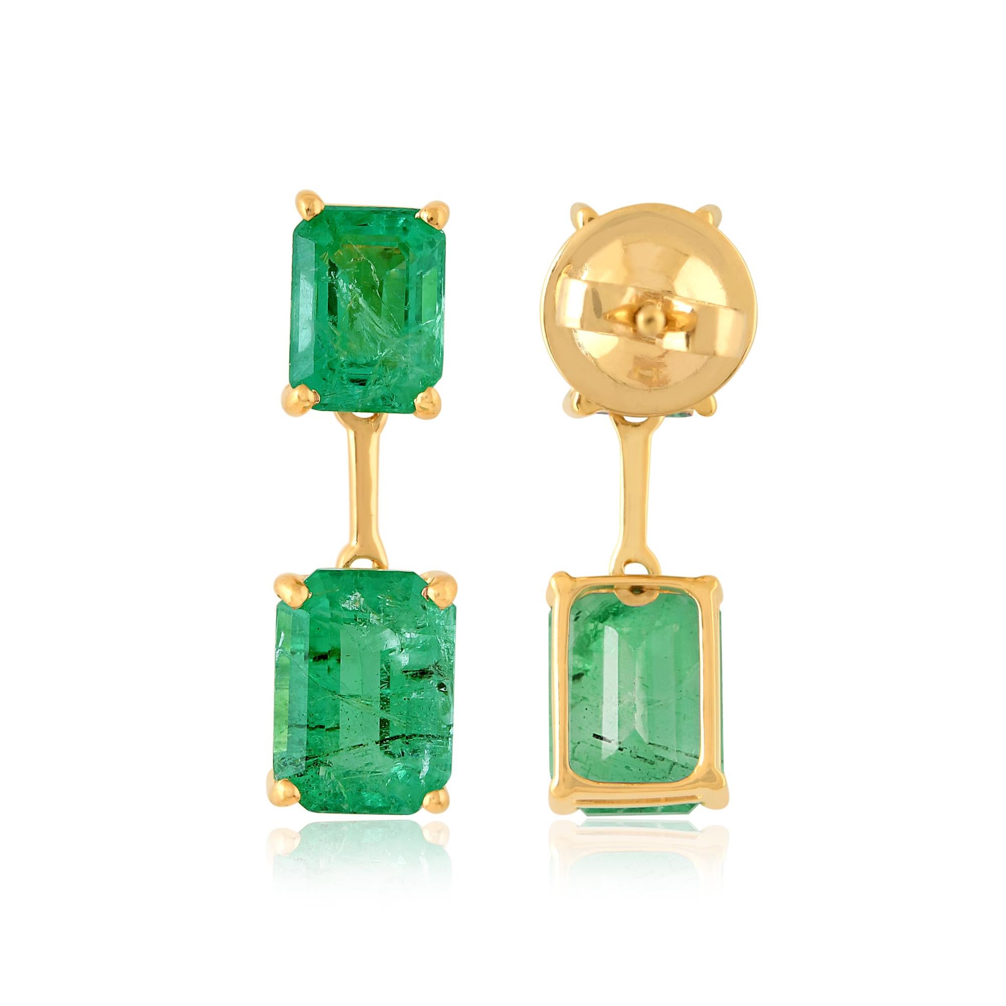Indulge in the timeless allure of these 4.70 Carat Octagon Natural Emerald Dangle Earrings, meticulously crafted in radiant 18 Karat Yellow Gold. These exquisite earrings are a celebration of sophistication and luxury, destined to become the