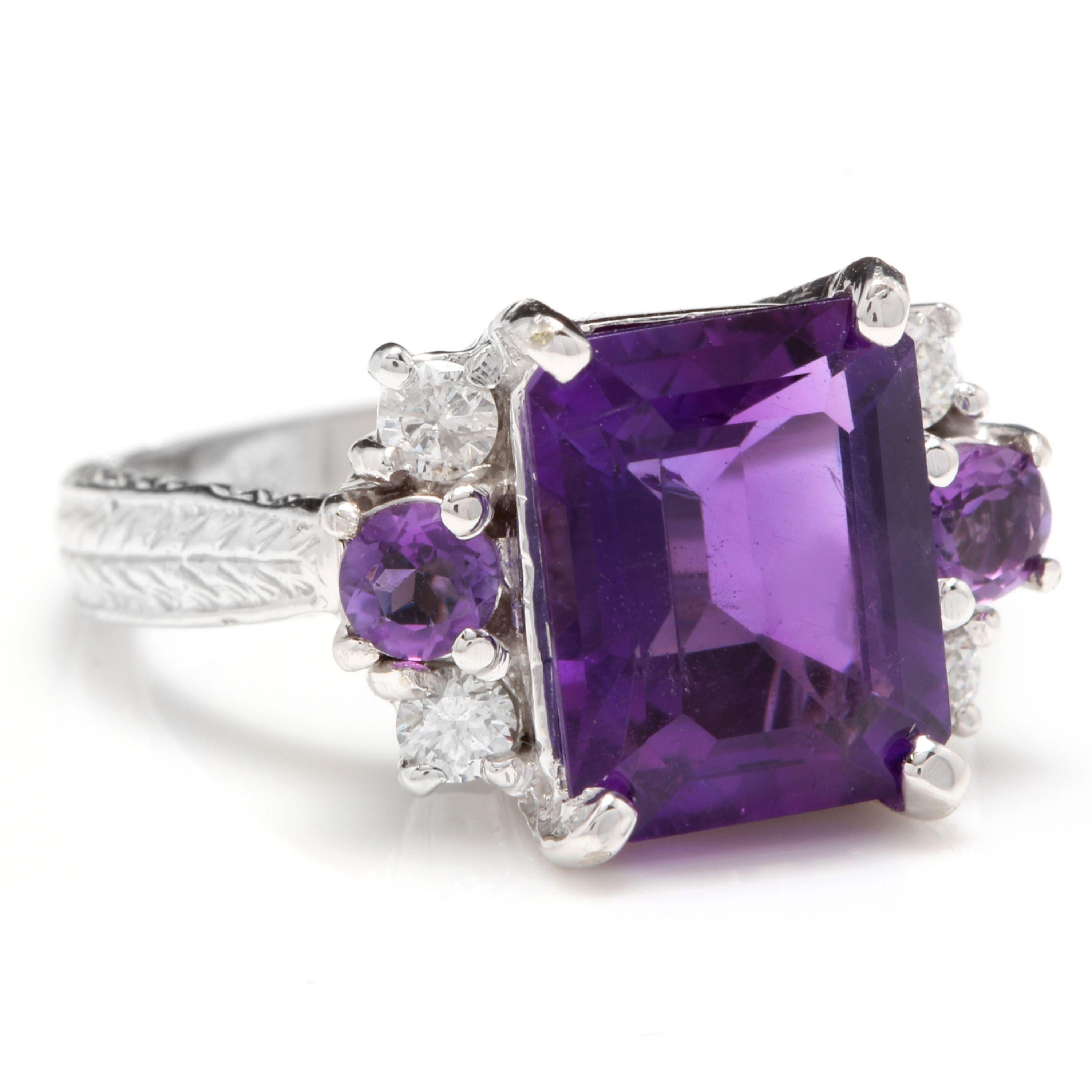 4.70 Carats Natural Amethyst and Diamond 14K Solid White Gold Ring

Total Natural Amethyst Weight is: Approx. 4.40 Carats

Center Emerald Cut Amethyst Weight is: Approx. 4.00 Carats

Center Amethyst Measures: Approx. 11.00mm x 9.00mm

Natural Round