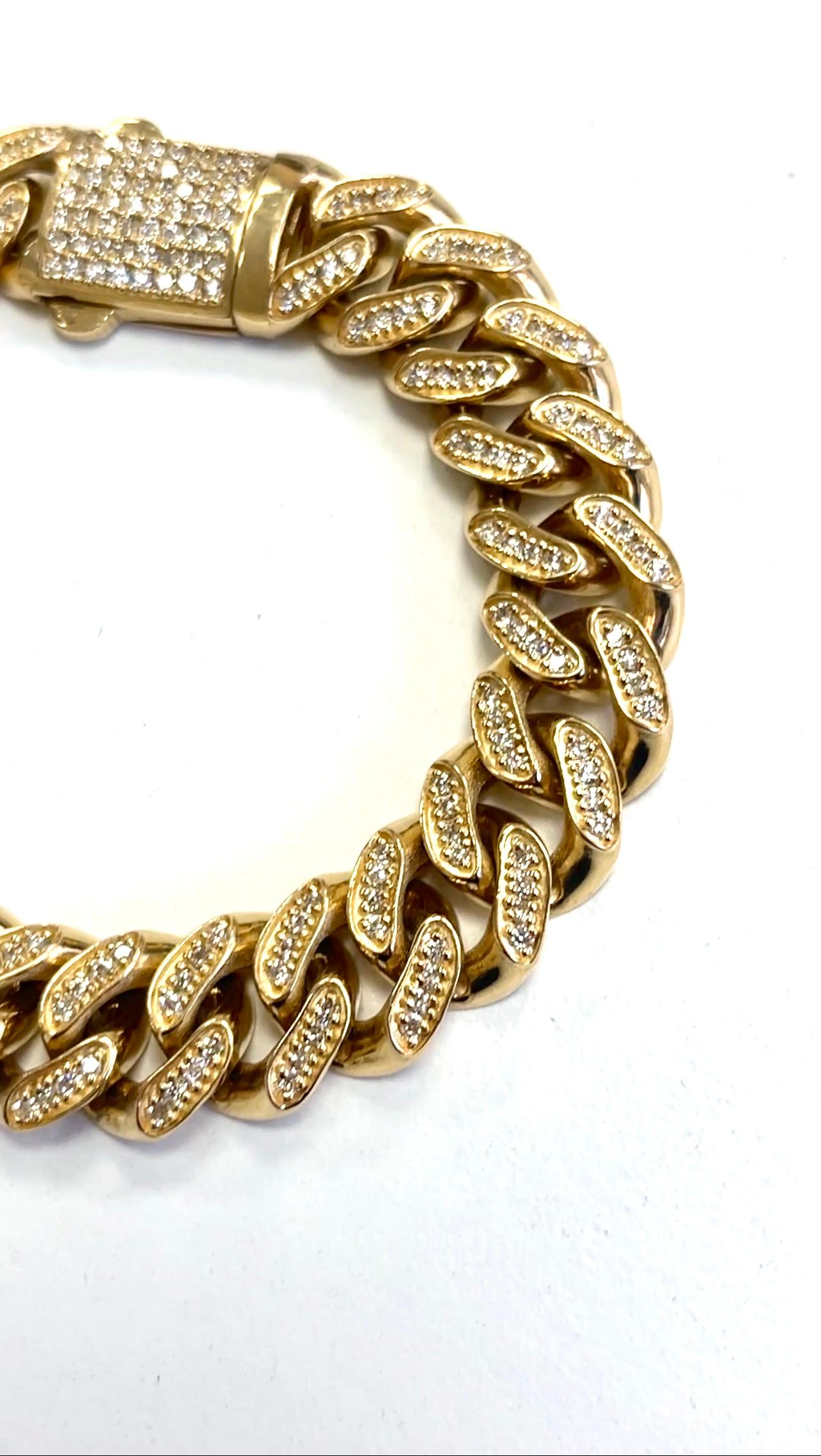 Bold and dazzling 4.70 cts all natural diamonds set in 14k yellow gold cuban link bracelet. 
7.7 inches length, average G-VS,12.7mm width, 29.06 grams

*Free shipping within the U.S.*