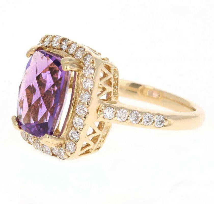 4.70 Carats Natural Impressive Amethyst and Diamond 14K Yellow Gold Ring

Total Natural Amethyst Topaz Weight: Approx. 4.00 Carats

Amethyst Measures: Approx. 11 x 9mm

Natural Round Diamonds Weight: Approx. 0.70 Carats (color G-H / Clarity