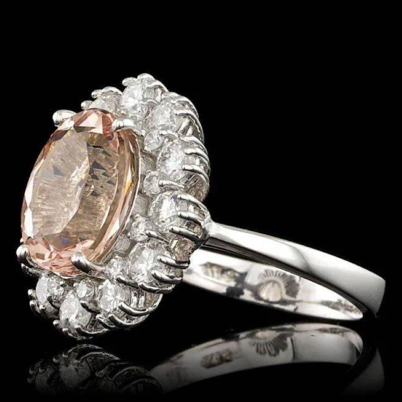 4.70 Carats Natural Morganite and Diamond 14K Solid White Gold Ring

Total Natural Morganite Weight is: Approx. 3.40 Carats 

Morganite Measures: Approx. 11 x 9 mm

Natural Round Diamonds Weight: Approx. 1.30 Carats (color G-H / Clarity