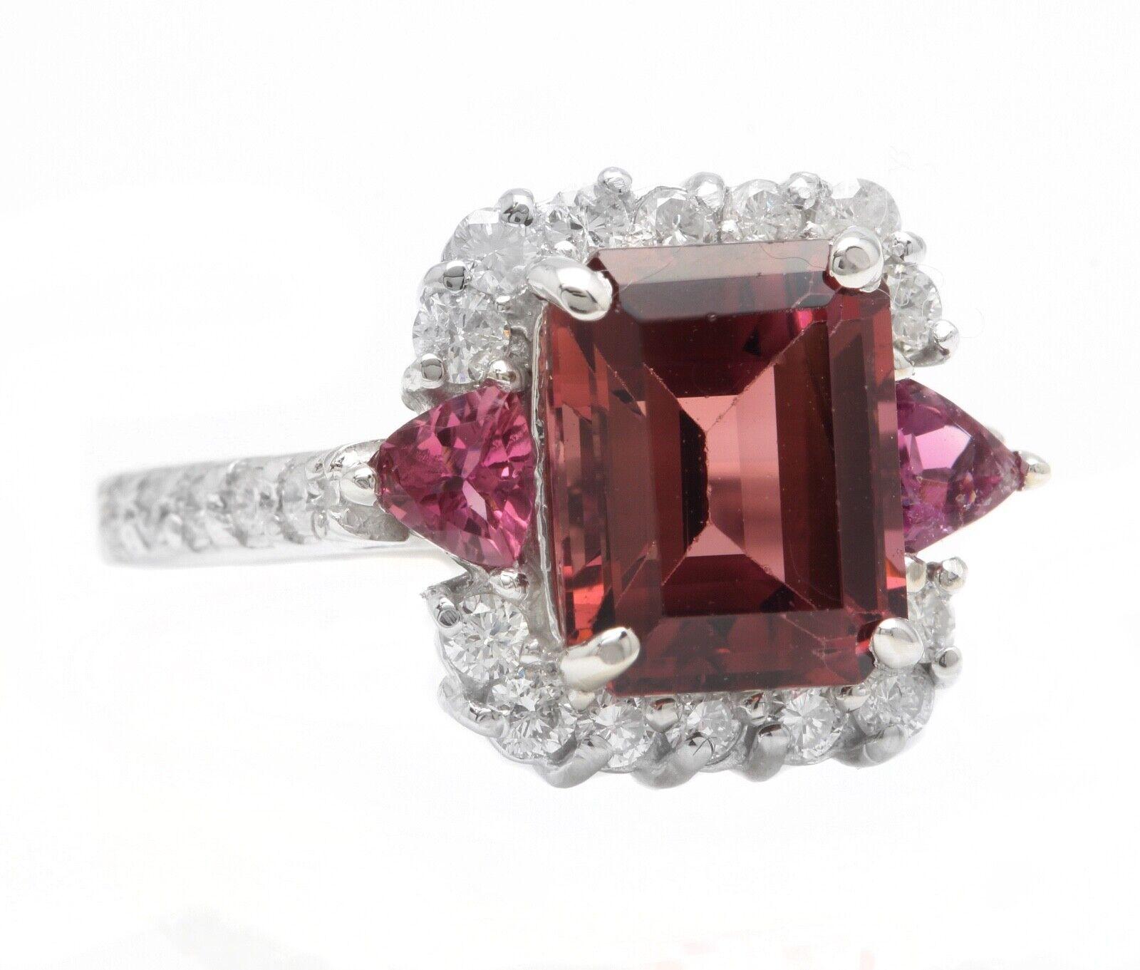 4.70 Carats Natural Very Nice Looking Tourmaline and Diamond 14K Solid White Gold Ring

Suggested Replacement Value:  $5,500.00

Total Natural Emerald & Trillion Cut Tourmaline Weight is: Approx. 4.05 Carats

Center Tourmaline Weight is: Approx.
