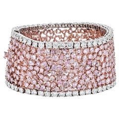 Bracciale a tappeto in platino e oro rosa con diamanti rosa da 47,00cttw
