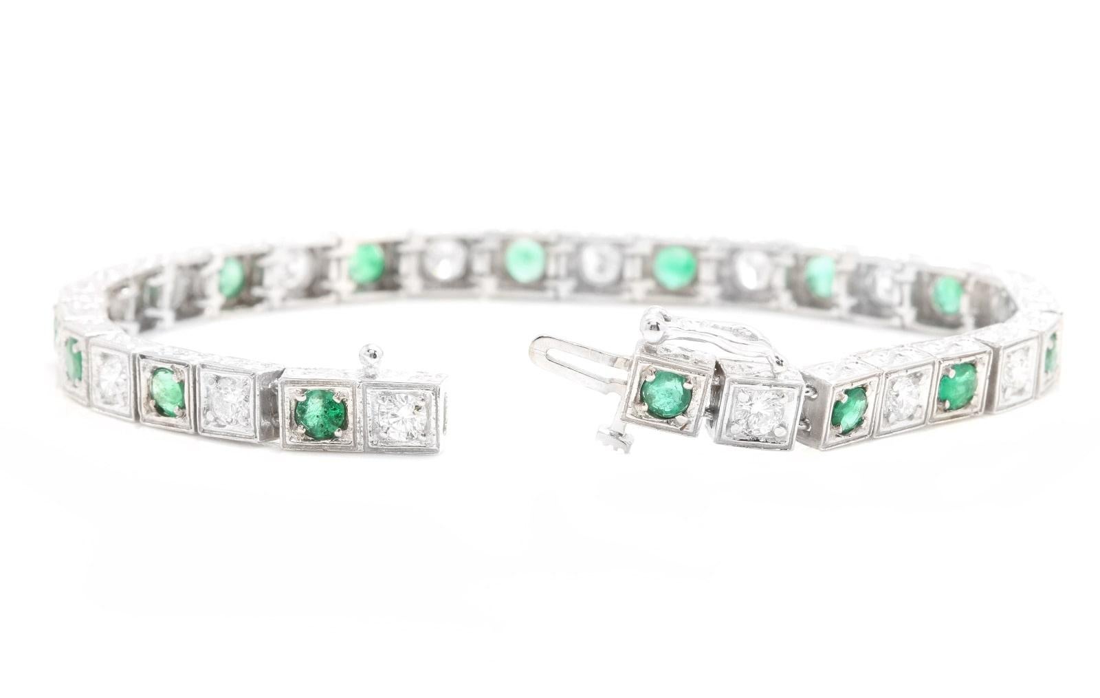 Very Impressive 4.70 Carats Natural Emerald & Diamond 14K Solid White Gold Bracelet 

Suggested Replacement Value: $8,000.00

STAMPED: 14K

Total Natural Round Diamonds Weight: Approx. 2.20 Carats (color G-H / Clarity SI1-SI2)

Total Natural Emerald