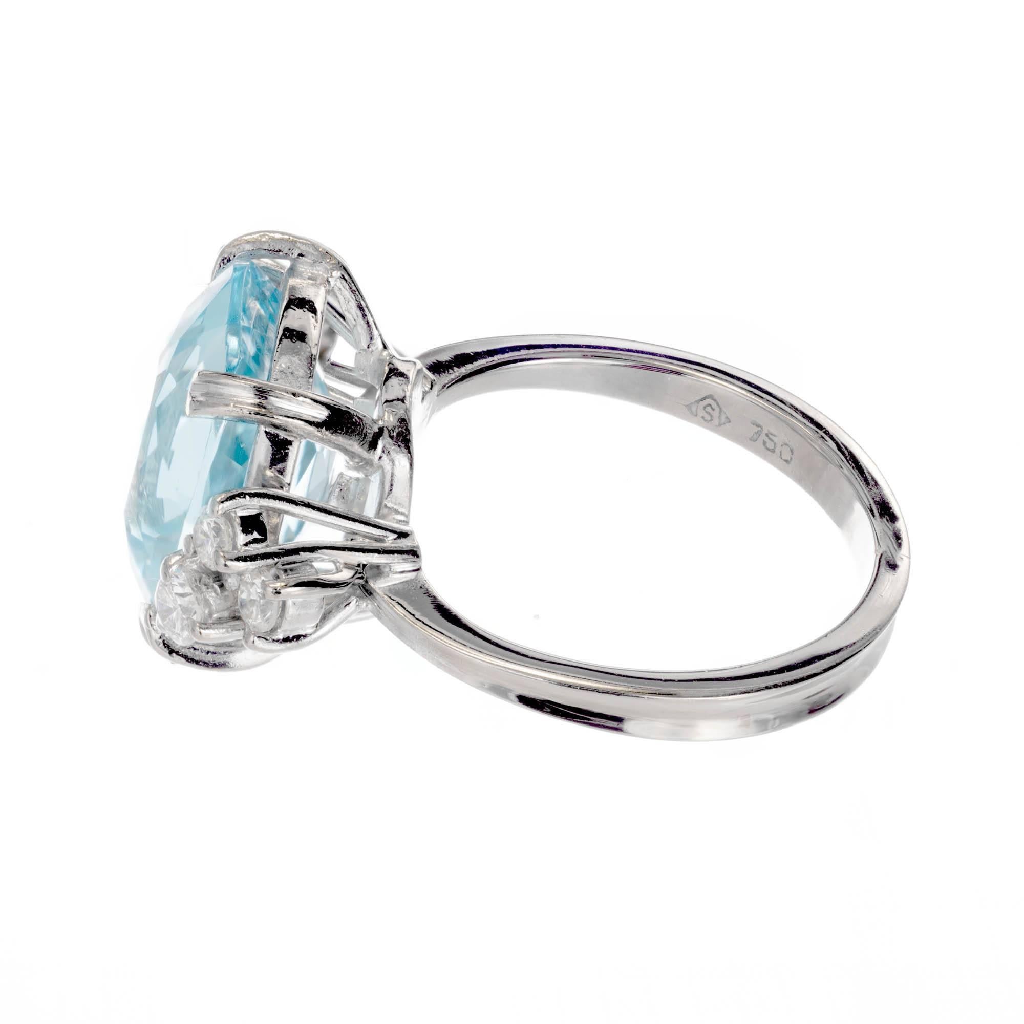 Greenish blue untreated Aqua and diamond engagement ring. In a handmade 18k white gold setting with bright sparkly diamonds.

1 antique cushion shape natural Aqua, no heat, approx. total weight 4.71cts, 11.9 x 10mm
6 full cut diamonds, approx. total