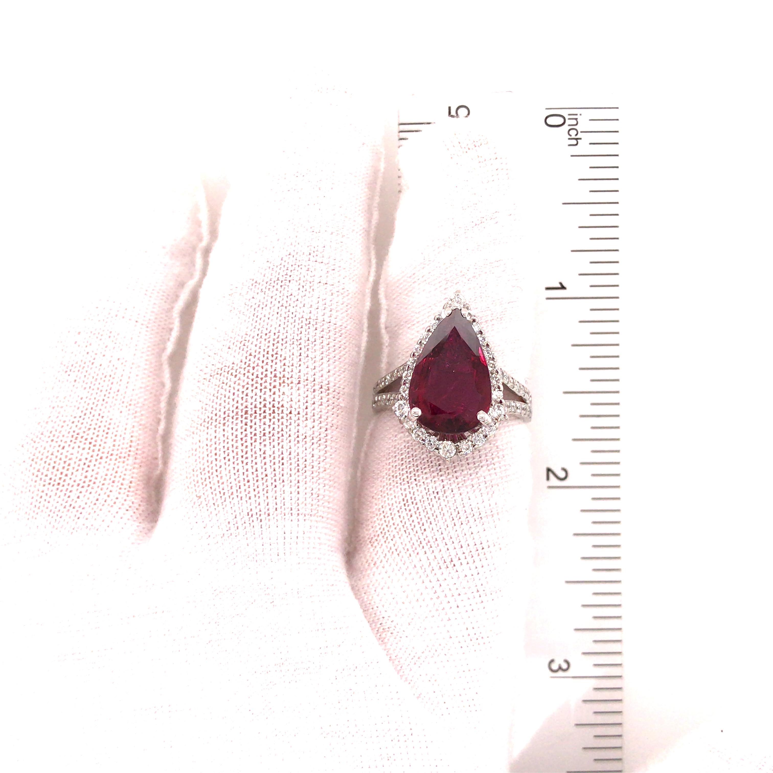 4.71 Carat Pear Shape Ruby and Diamond Halo Ring in 14 Karat White Gold In Good Condition For Sale In Boca Raton, FL