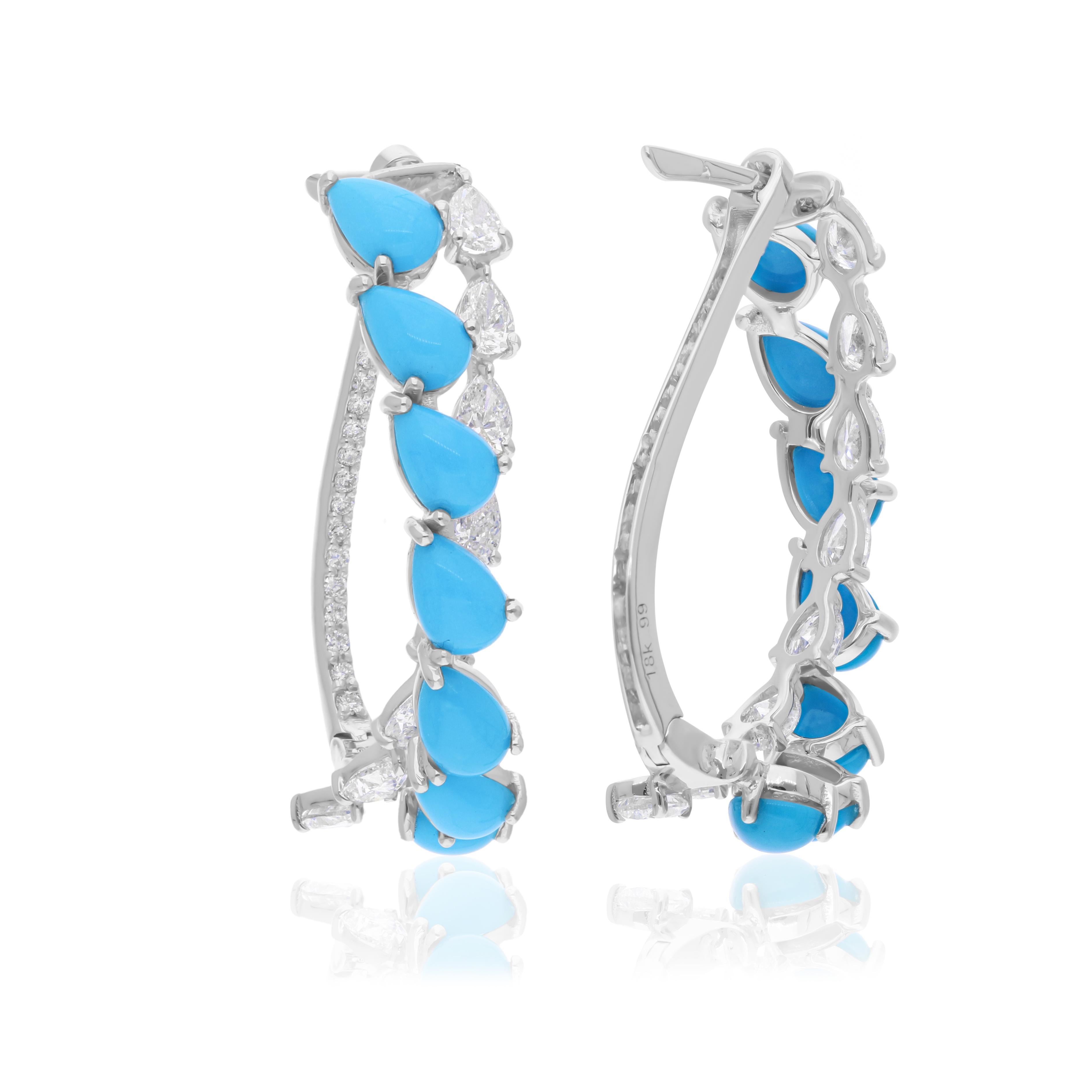 Cast from 18-karat gold, these exquisite earrings are handset with 4.71 carats turquoise and 2.16 carats of sparkling diamonds.

FOLLOW SPECTRUM JEWELS storefront to view the latest collection & exclusive pieces. Spectrum Jewels is proudly rated as