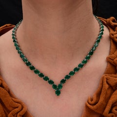 47.19 Carat Graduated Oval Zambian Emerald V Shape Necklace 14 Karat White Gold