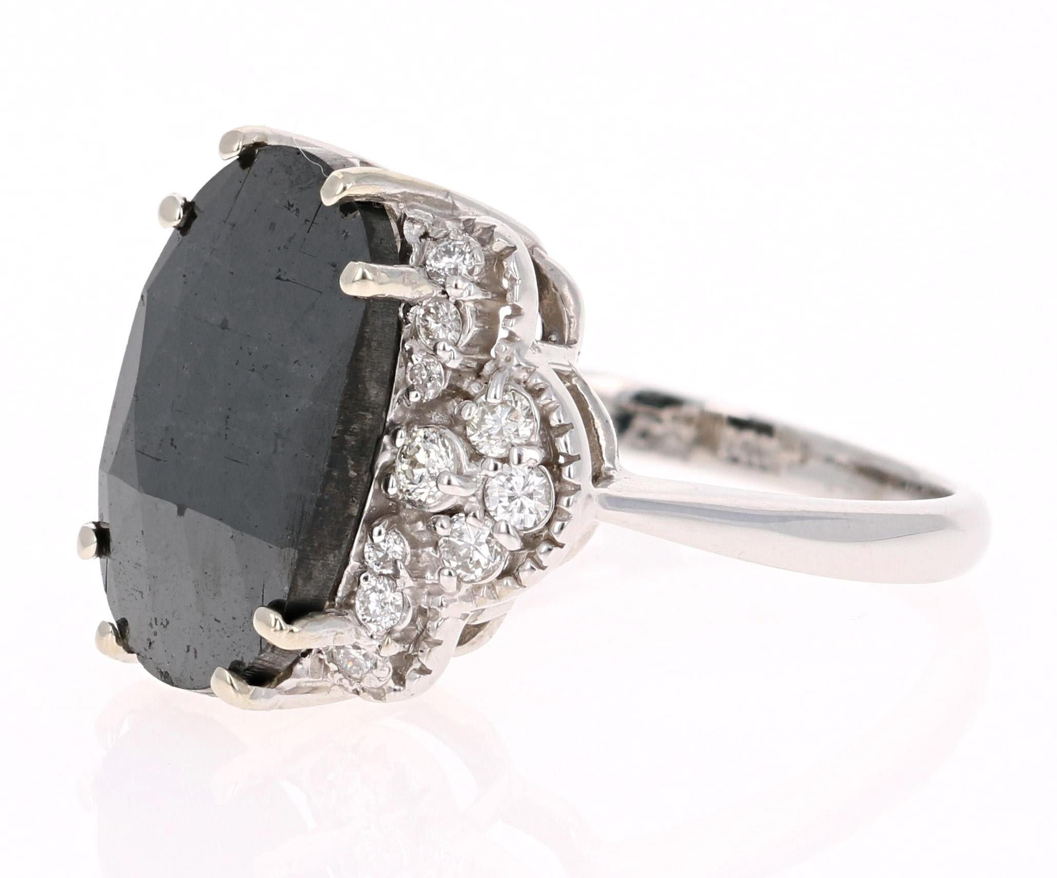 BOLD AND BEAUTIFUL!! 
4.72 Carat Black Diamond White Gold Cocktail or Fashion Ring! Can also be used as a very unique and rare Engagement or Bridal Ring!  

A 4.30 Carat elongated Oval Cut Black Diamond sits in the center and is surrounded by White