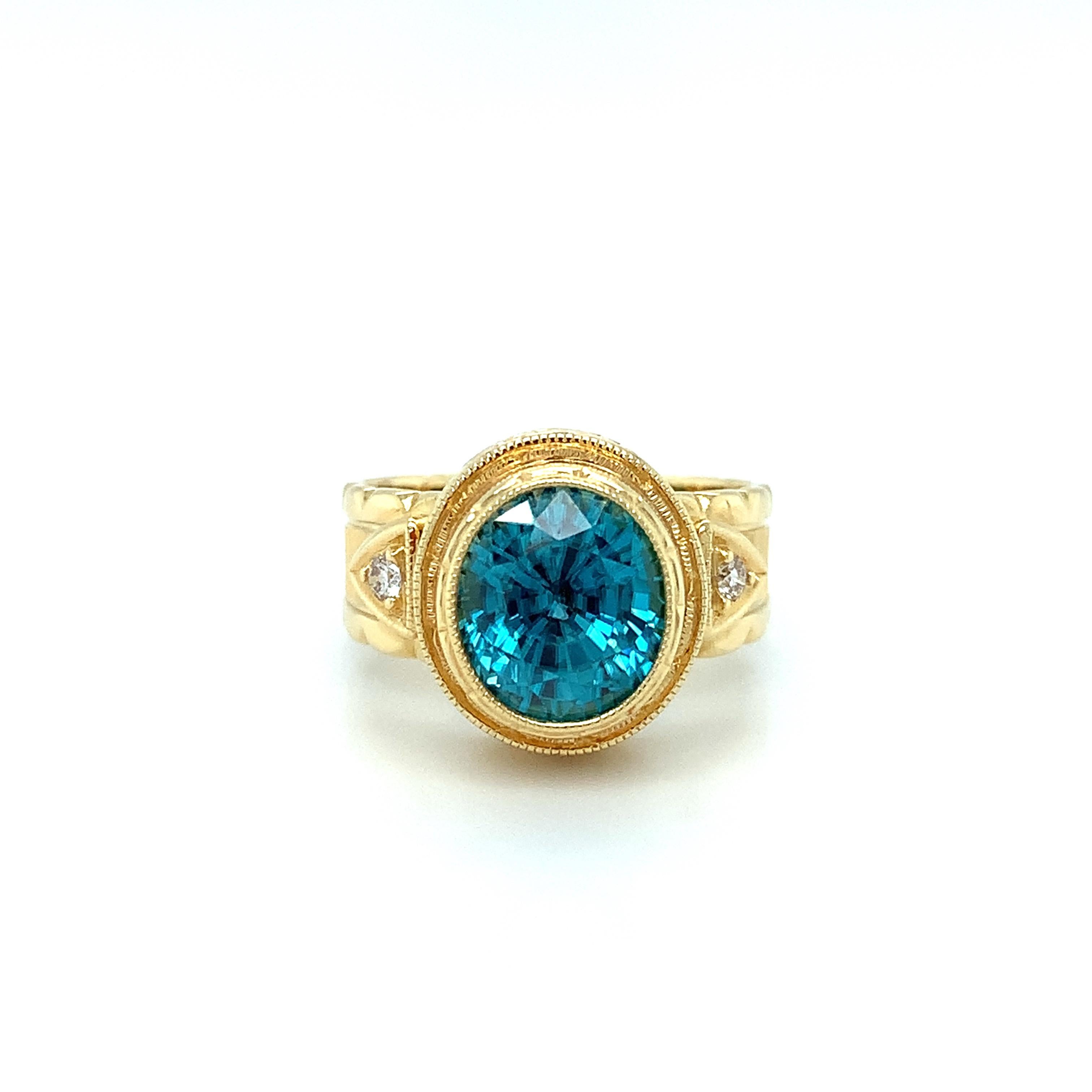 Strikingly brilliant with amazing, almost neon Tahitian blue color, this 4.72 carat zircon is absolutely stunning set in one of our most popular signature designs. This vibrant gem has the superior brilliance characteristic of zircons, and is