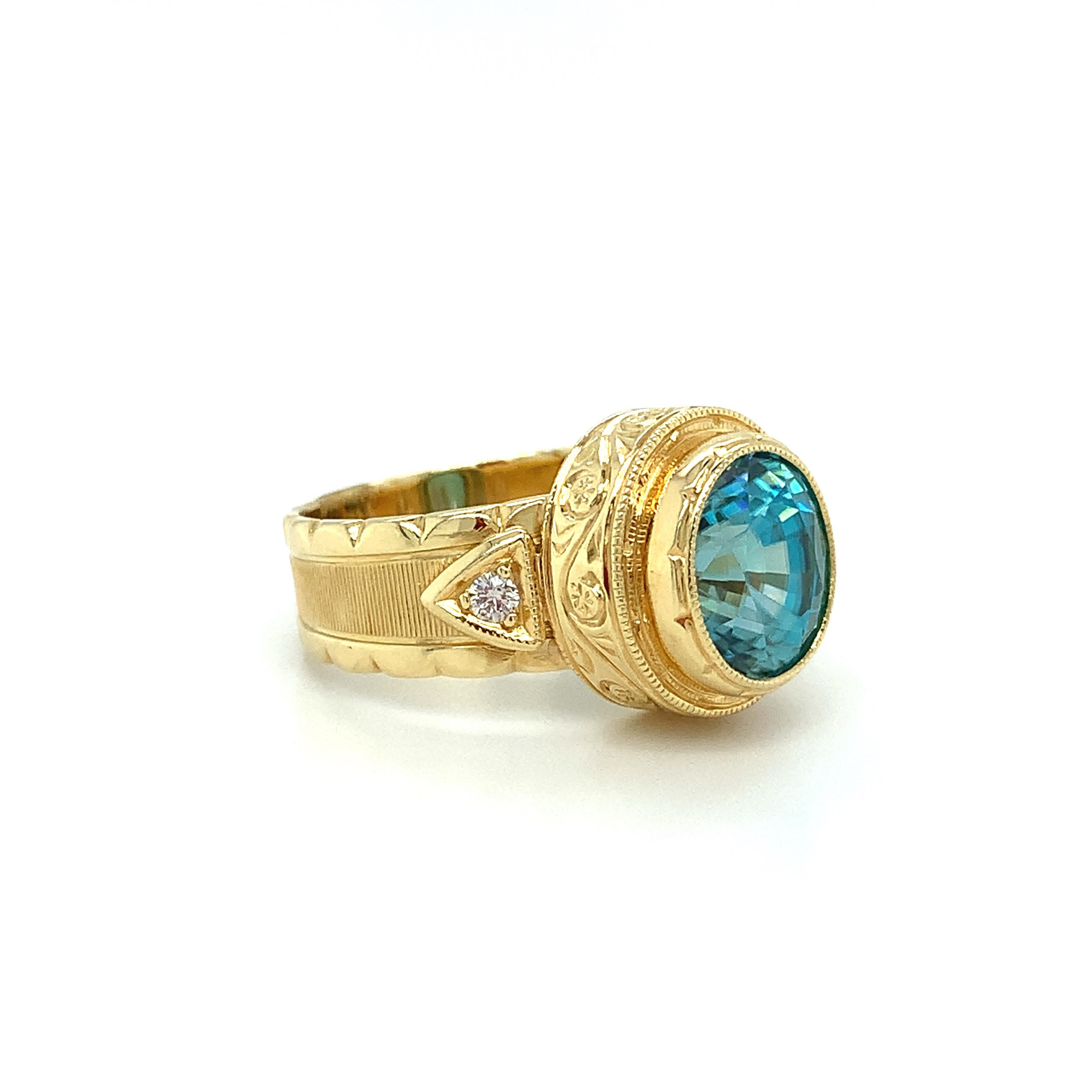 Oval Cut 4.72 Carat Blue Zircon and Diamond Hand-Engraved Band Ring in 18k Yellow Gold   For Sale