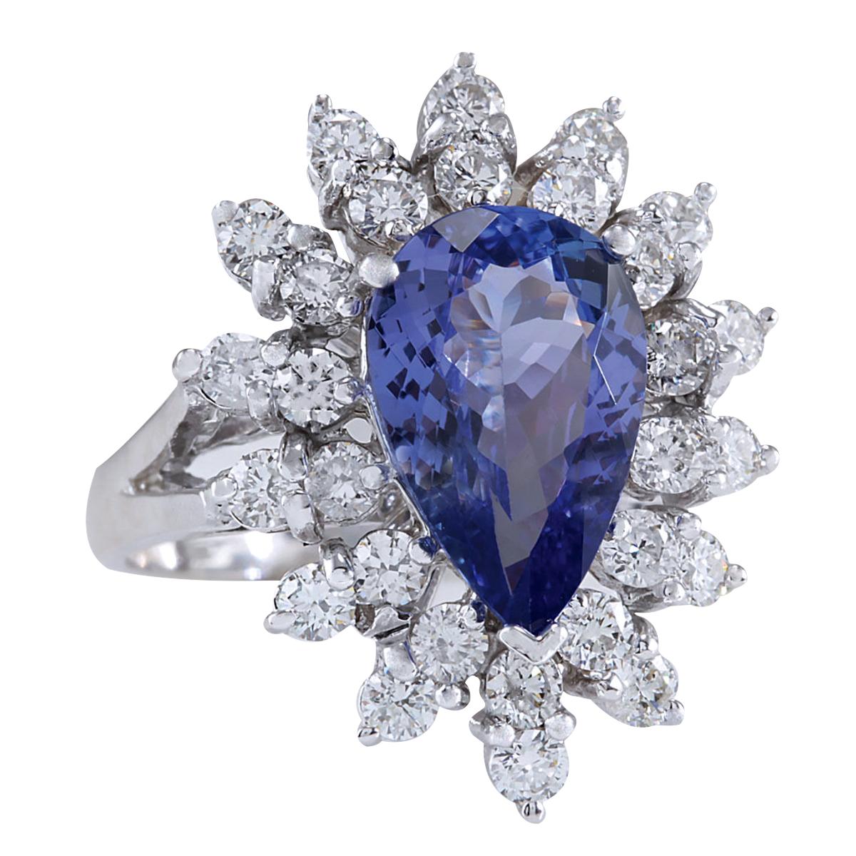 4.72 Carat Natural Tanzanite 14 Karat White Gold Diamond Ring
Stamped: 14K White Gold
Total Ring Weight: 7.0 Grams
Total Natural Tanzanite Weight is 3.32 Carat (Measures: 13.90x8.50 mm)
Color: Blue
Total Natural Diamond Weight is 1.40 Carat
Color: