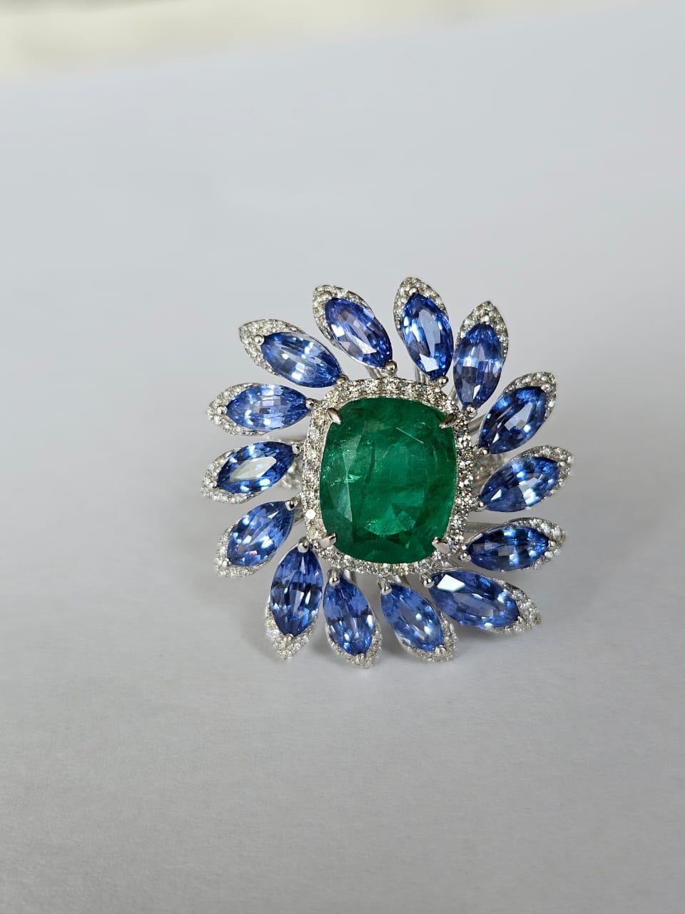 Emerald Cut 4.72 carats, Zambian Emerald, Blue Sapphires & Diamonds Cocktail Ring