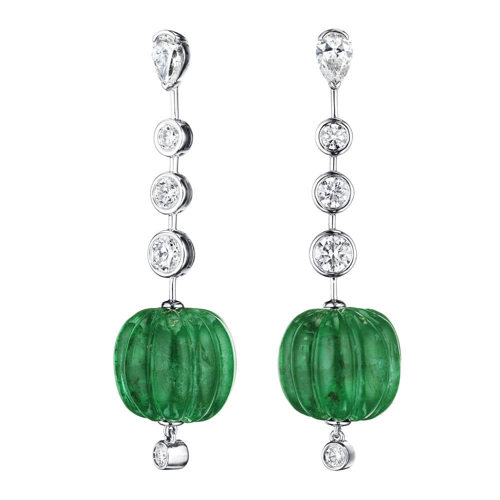 •	18KT White Gold
•	47.26 Carats
•	Sold as a pair (2 earrings in total)

•	Number of Emeralds: 2
•	Carat Weight: 44.45ctw

•	Number of Pear Shape Diamonds: 2
•	Carat Weight: 0.99ctw

•	Number of Round Diamonds: 10
•	Carat Weight: 1.82ctw

•	These