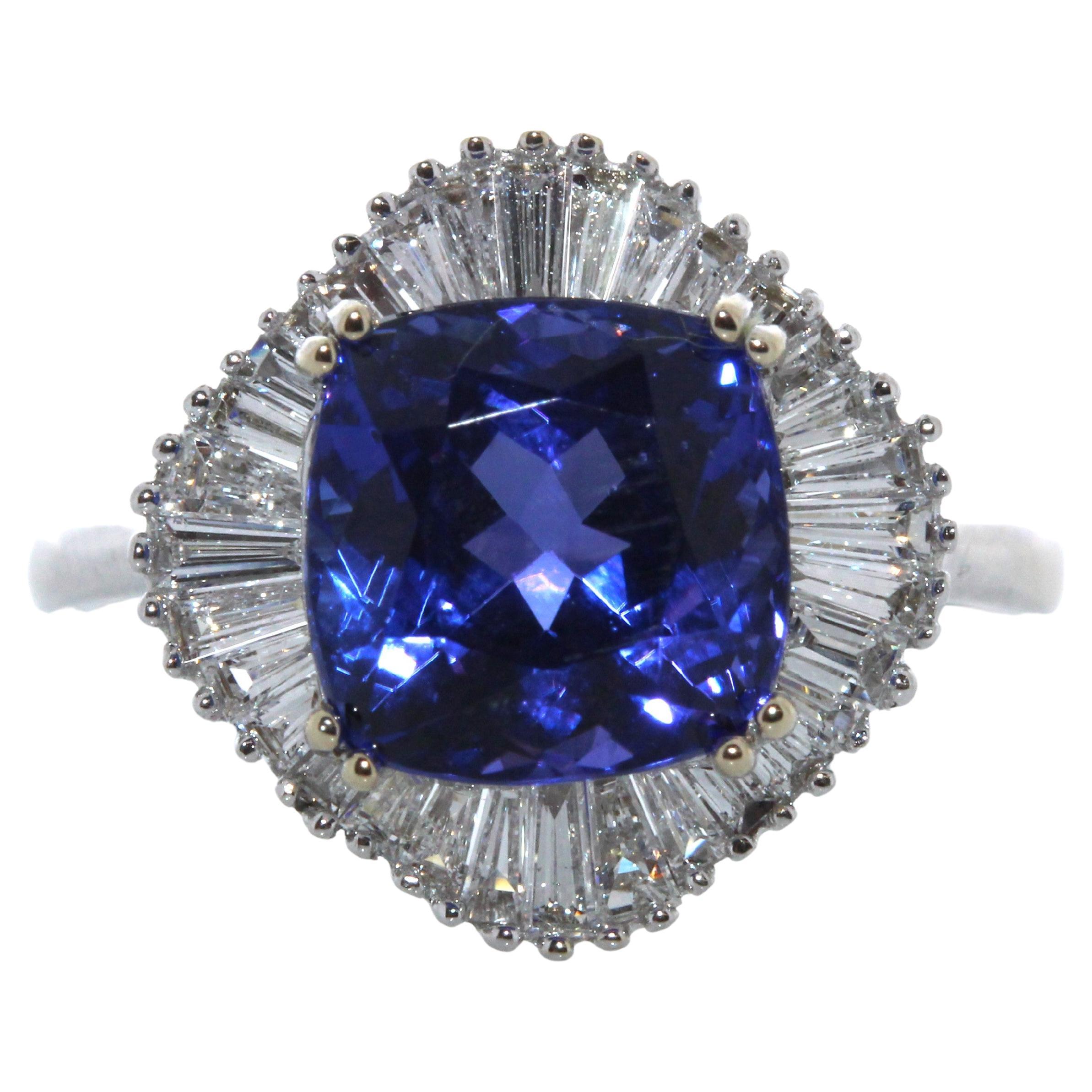 4.72ct Tanzanite and .62ctw Diamond Ring in 18K White Gold For Sale