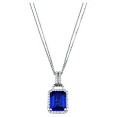 4.73 Carat Emerald Cut Tanzanite & Diamond Halo 18 Karat Gold Pendant Necklace