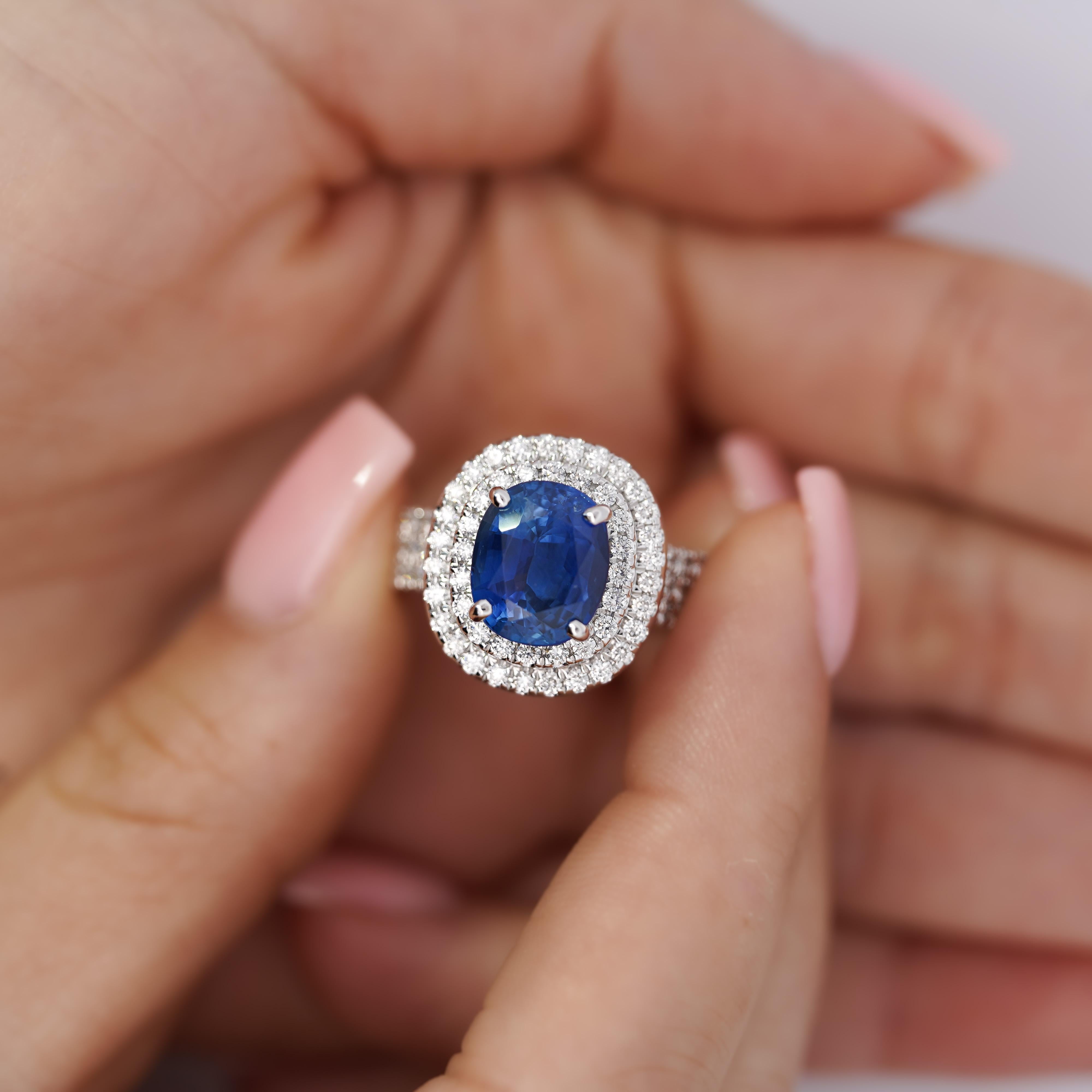 Modern 4.73 Carat GRS Certified Oval Blue Sapphire & Double Diamond Halo Ring