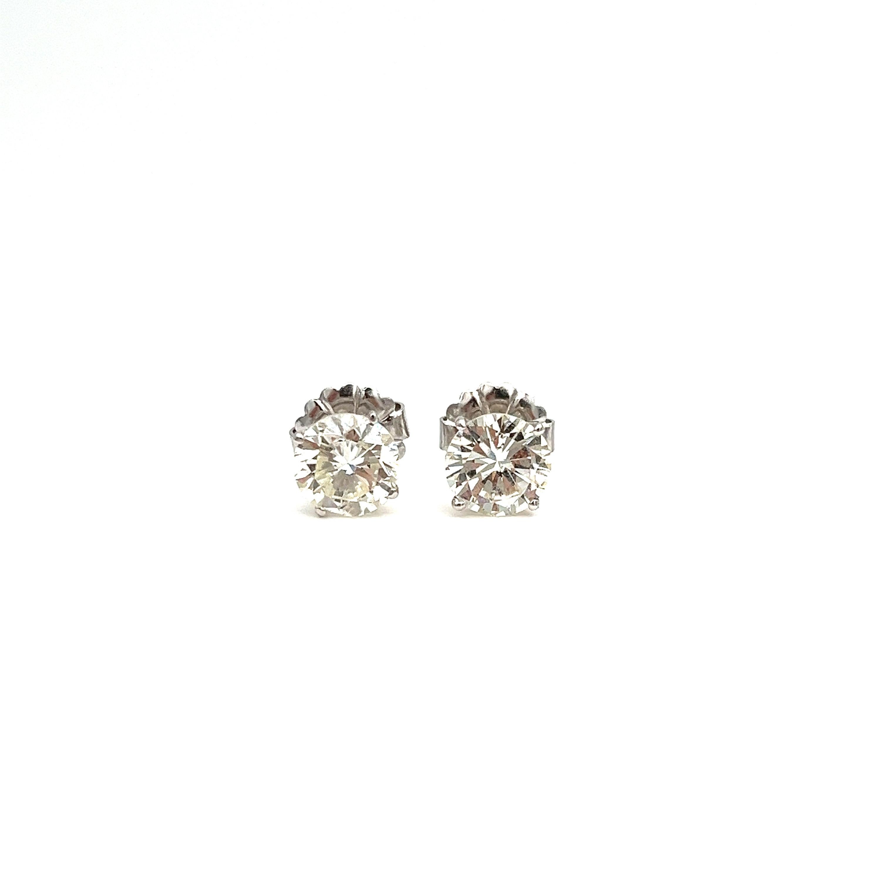 Round Cut 4.73 ct Diamond Stud Earrings  For Sale