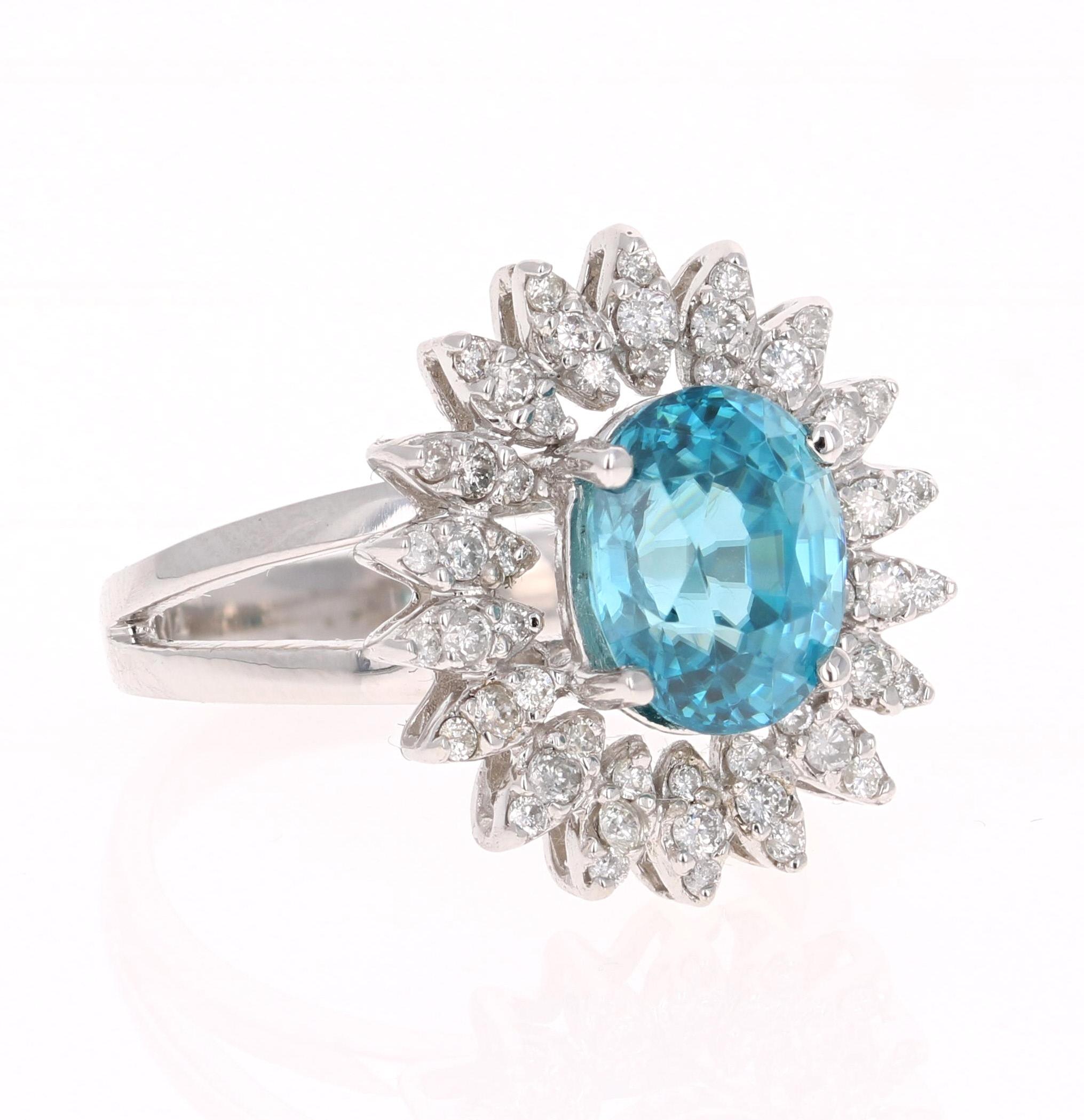 A Dazzling Blue Zircon and Diamond Ring! Blue Zircon is a natural stone mined in different parts of the world, mainly Sri Lanka, Myanmar, and Australia. 

This Oval Cut Blue Zircon is 4.26 Carats and is surrounded by 54 Round Cut Diamonds that weigh