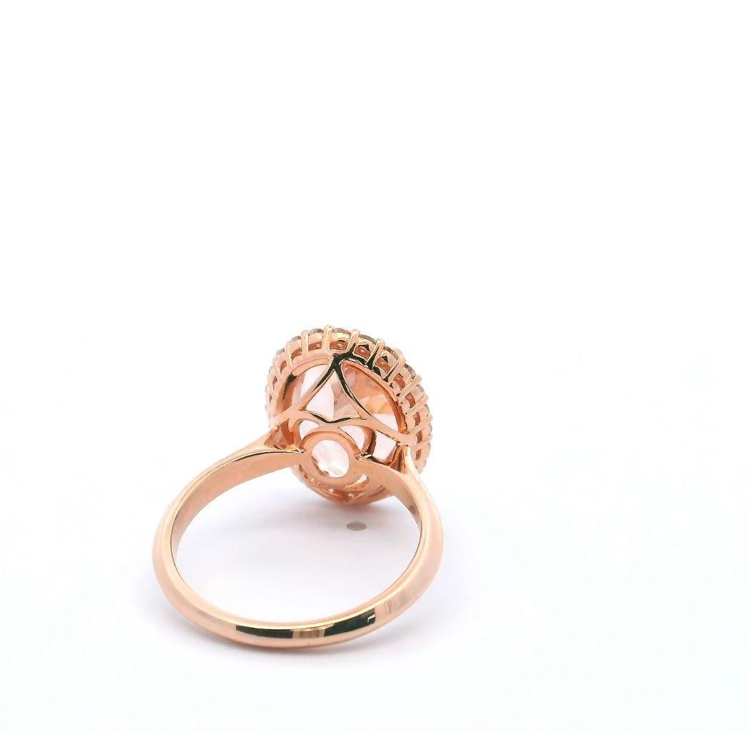 Women's 4.74 Carat Oval Morganite Ring with 0.44 Carat Halo of Diamonds in 14K Rose Gold For Sale