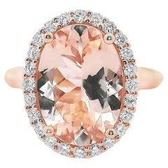 4.74 Carat Oval Morganite Ring with 0.44 Carat Halo of Diamonds in 14K Rose Gold