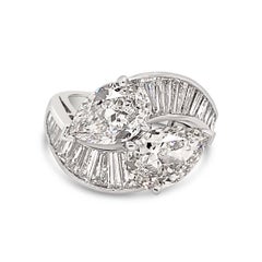 Bague bypass en platine avec diamants taille poire et baguette de 4,74 carats poids total