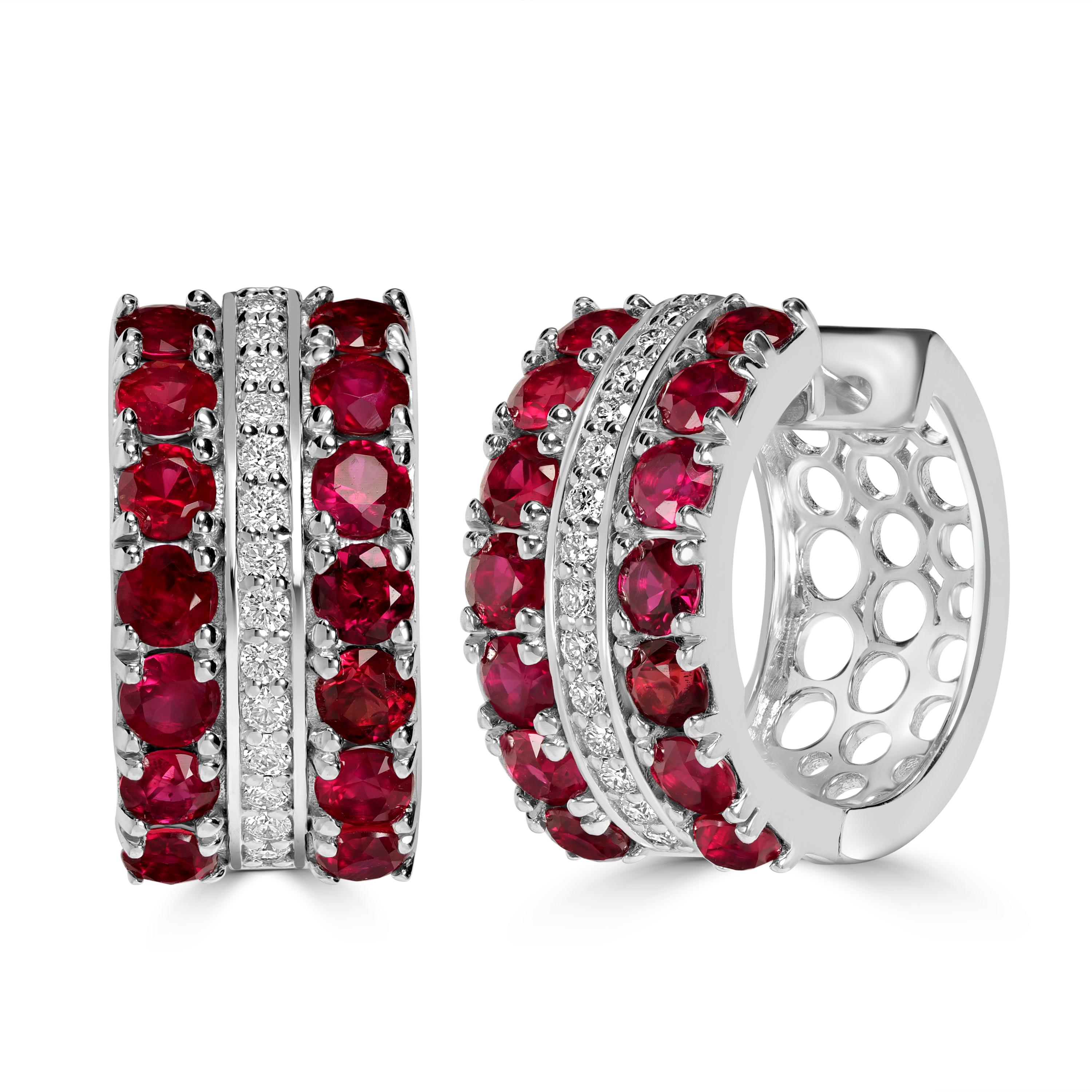 Designed in the heart of New York City, we present to you our 4.74 Carats Rubies and Diamonds Cuff Earrings made in 18k White Gold. This piece of earring consists of non commercial quality rubies and diamonds meaning we used high value and high