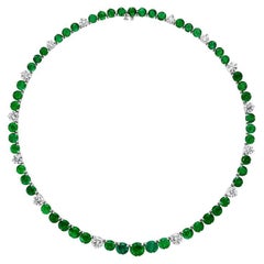 47.42ct GIA Round Diamond & Emerald Tennis Necklace in 18KT Gold