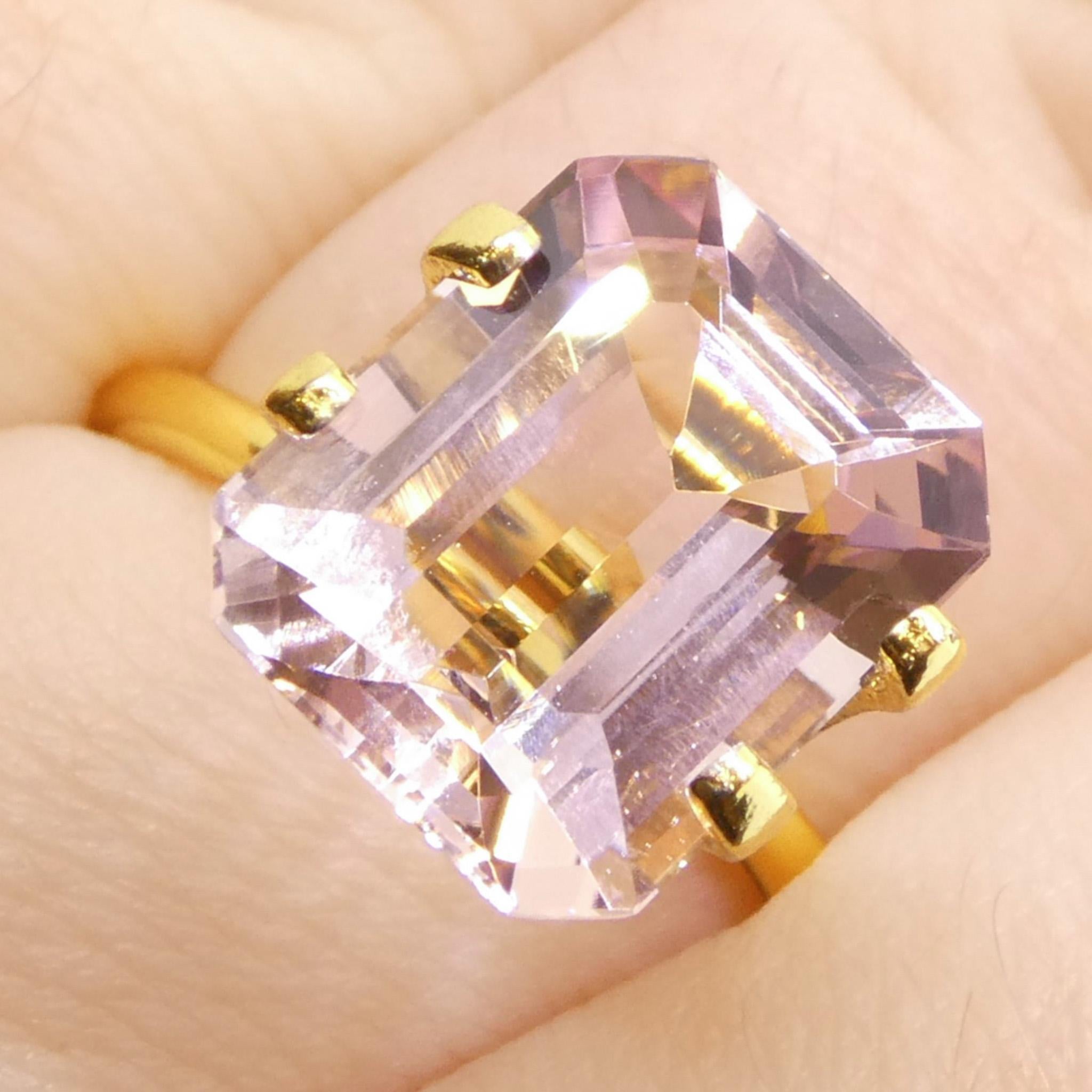 Description:

Gem Type: Morganite 
Number of Stones: 1
Weight: 4.74 cts
Measurements: 11.86 x 9.85 x 5.94 mm
Shape: Octagonal/Emerald Cut
Cutting Style Crown: Step Cut
Cutting Style Pavilion: Step Cut 
Transparency: Transparent
Clarity: Very Very