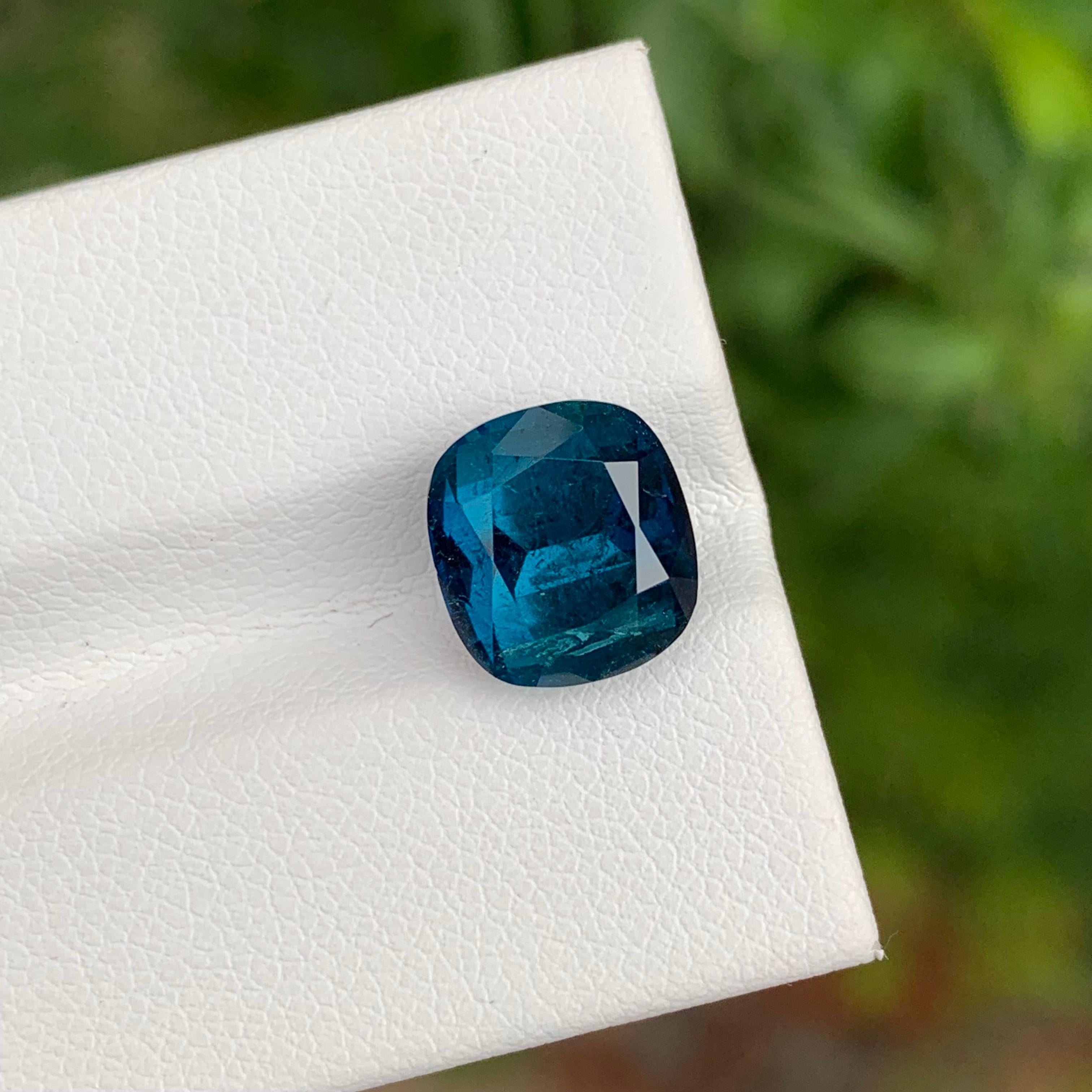 Loose Indicolite Tourmaline

Weight: 4.75 Carats
Dimension: 9.8 x 9 x 7.4 Mm
Colour: Ink Blue 
Origin: Afghanistan
Certificate: On Demand
Treatment: Non
Shape: Cushion


Tourmaline is a captivating gemstone known for its remarkable variety of