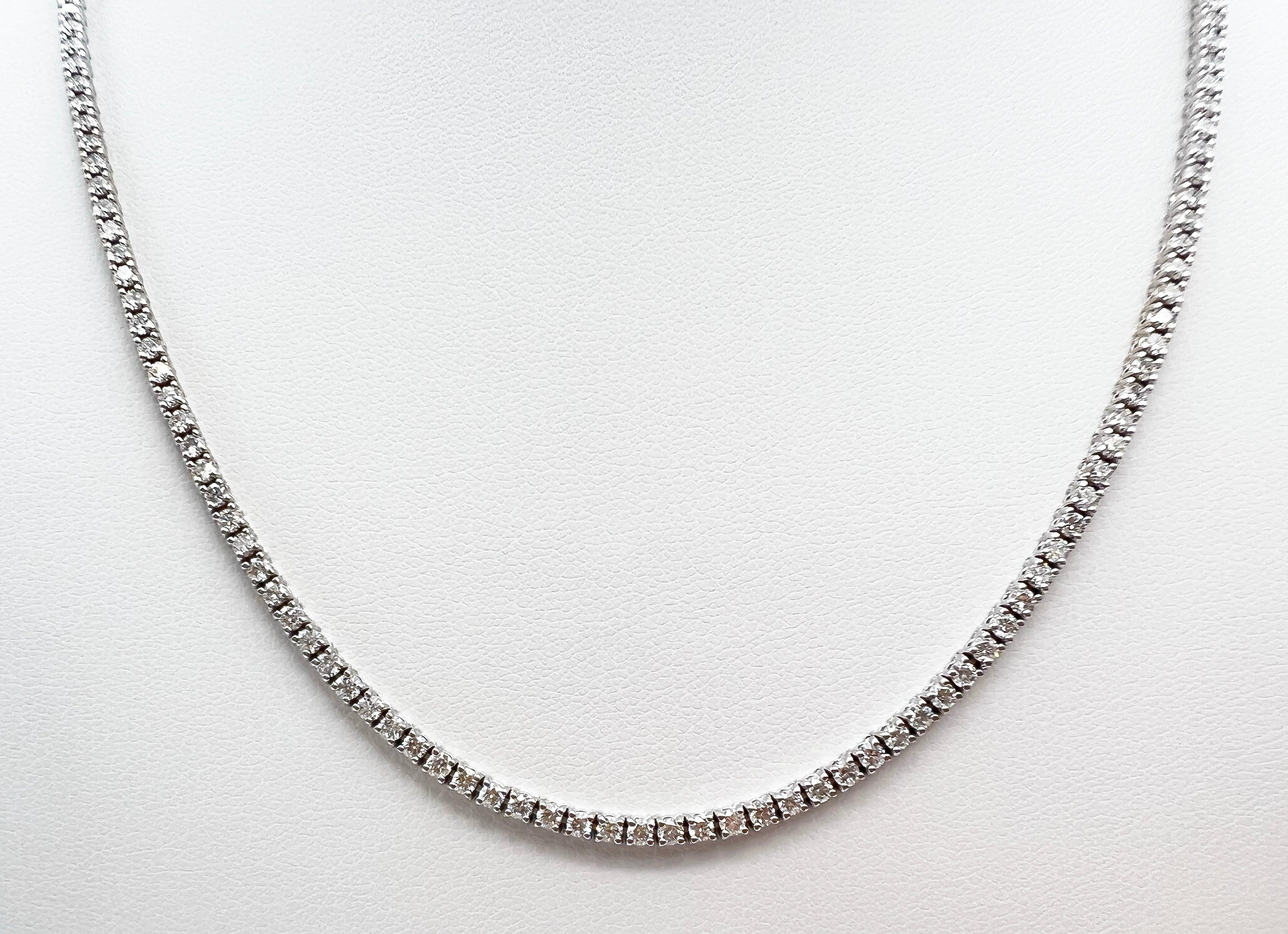 4.75 Carat Diamond Tennis Necklace with Round Diamonds in White Gold Chain

Tennis necklaces are the epitome of versatility and elegance. Here we have a classic, timeless piece that you could wear it everyday or only on occasions, alone or paired