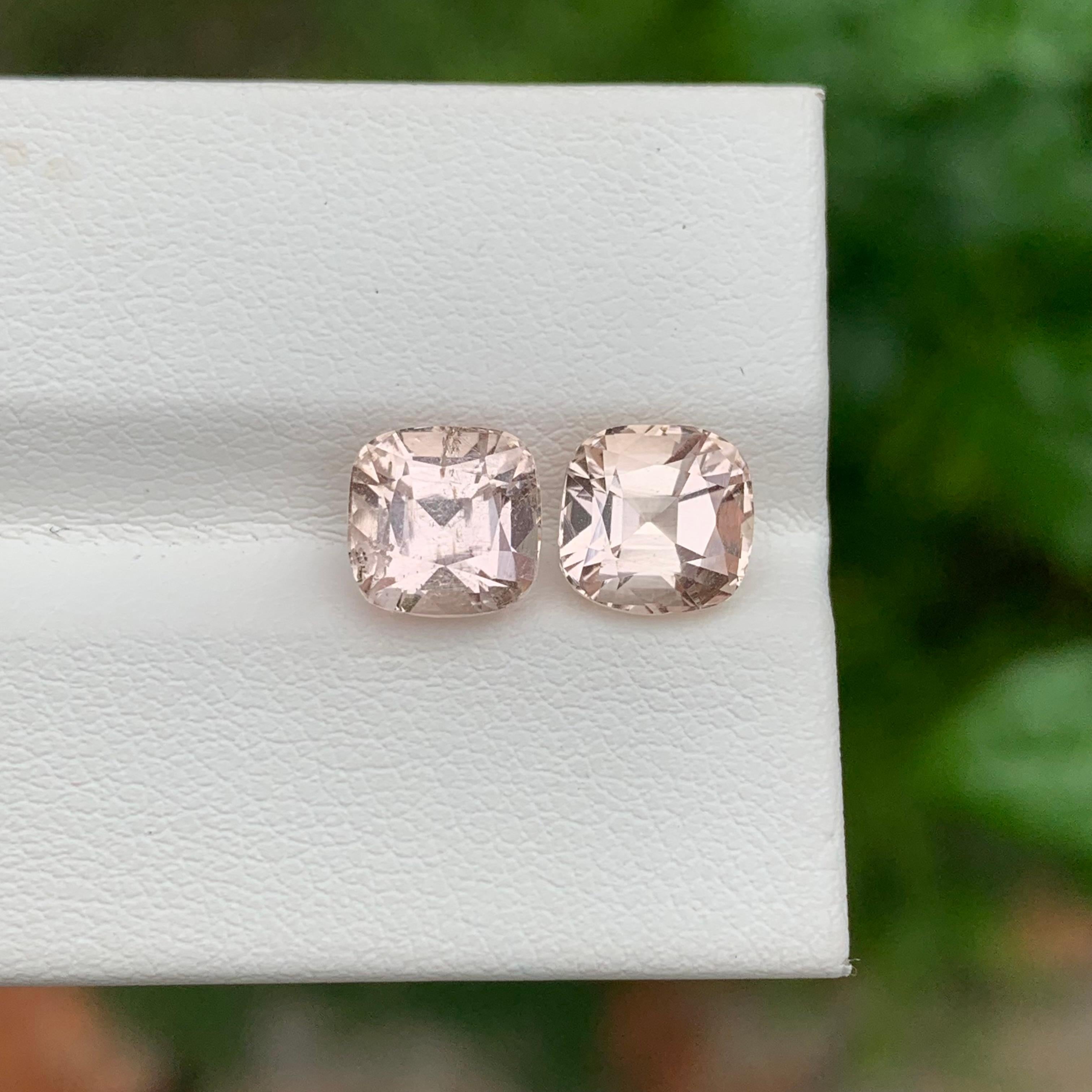 Faceted Imperial Topaz Pair 
Weight: 4.75 Carats
Dimension: 7.2 x 7.1 x 5.5 Mm And 
                    7.2 x 7.1 x 5.9 Mm
Origin: Katlang Pakistan
Shape: Cushion
Color; Imperial Golden 
Treatment: Non
Certificate: On Demand

Imperial Topaz