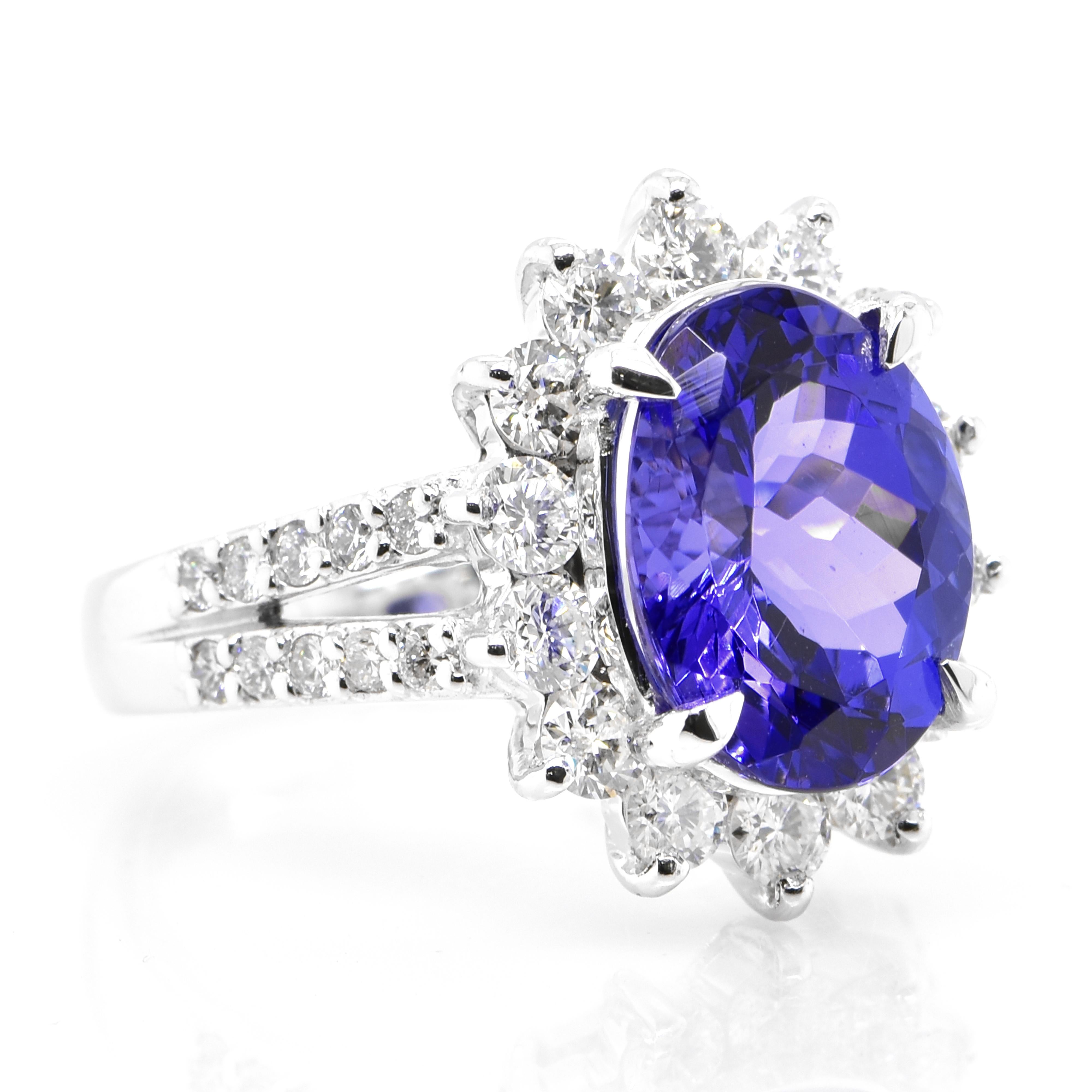 Oval Cut 4.75 Carat Natural Tanzanite and Diamond Cocktail Ring Set in Platinum For Sale