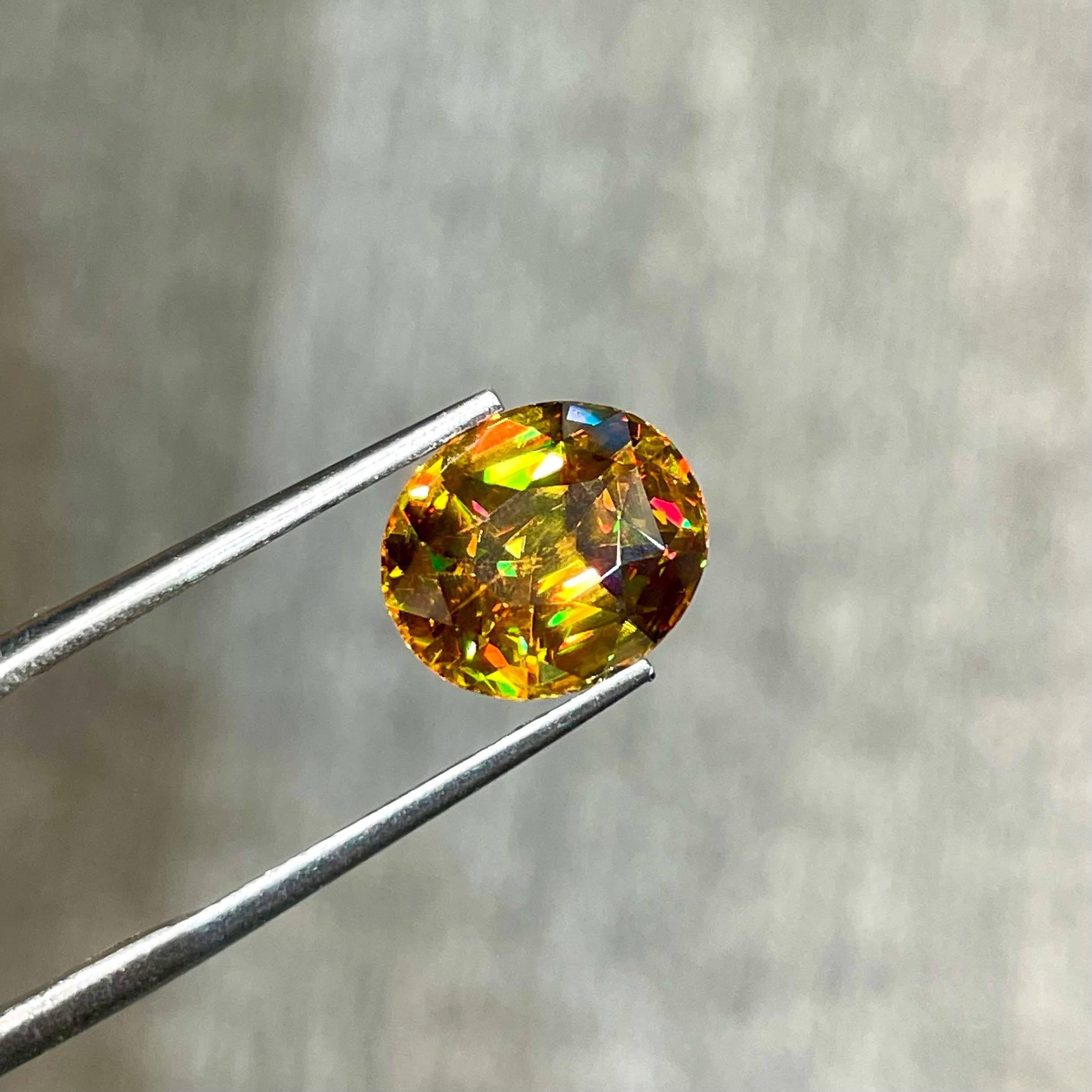 Weight 4.75 carats 
Dimensions 10.9x9.3x6.5 mm
Treatment none 
Origin Madagascar 
Clarity VVS/Better
Shape oval 
Cut Fancy Oval 





The exquisite beauty of a 4.75-carat Sphene stone unfolds in this fine example of a gem from Madagascar. Exhibiting